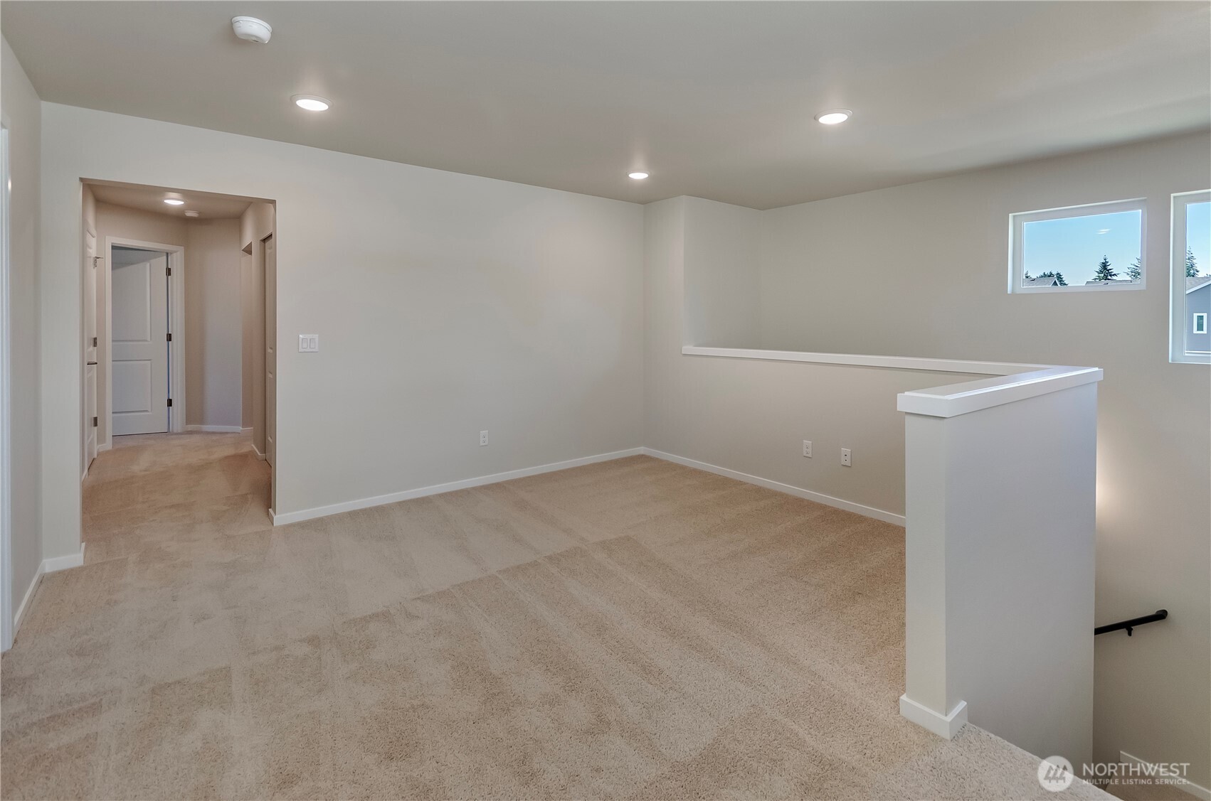 Photos are taken of a Shelby plan previously built in the community.