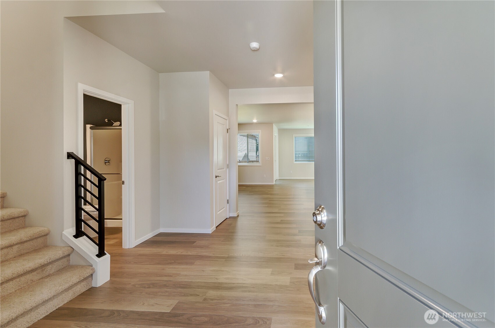 Photos are taken of a Shelby plan previously built in the community.