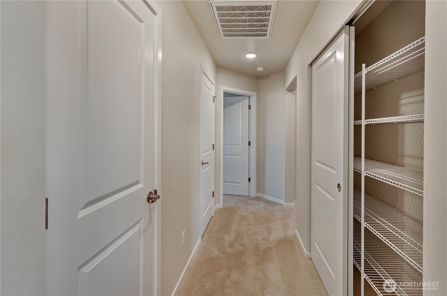 Photos are taken of a Shelby plan previously built in the community.