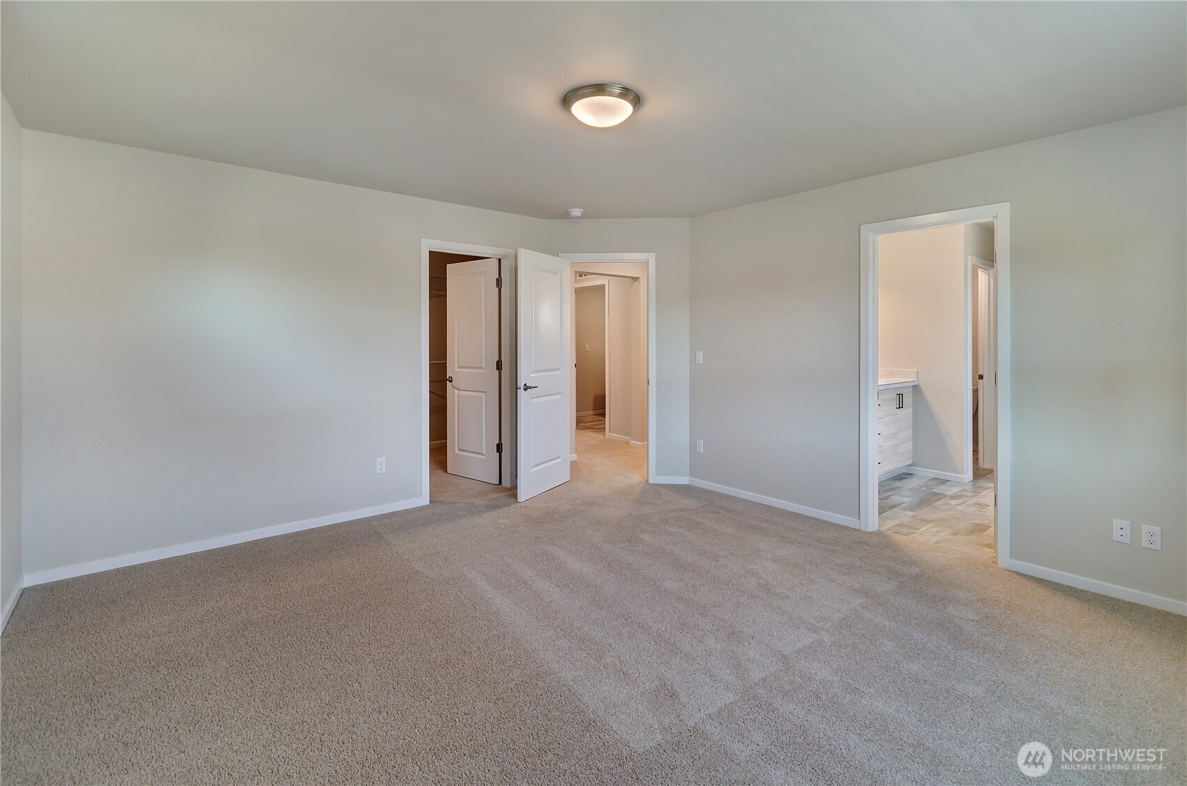 Photos are taken of a Shelby plan previously built in the community.