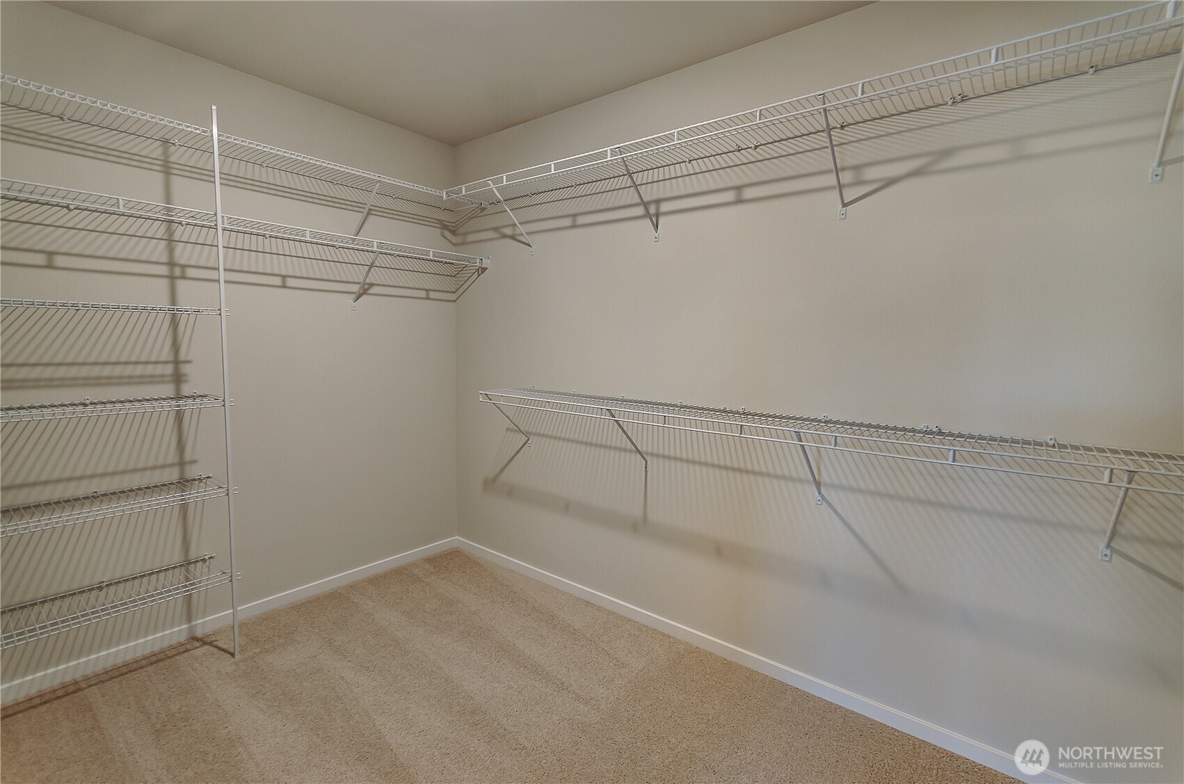 Photos are taken of a Shelby plan previously built in the community.