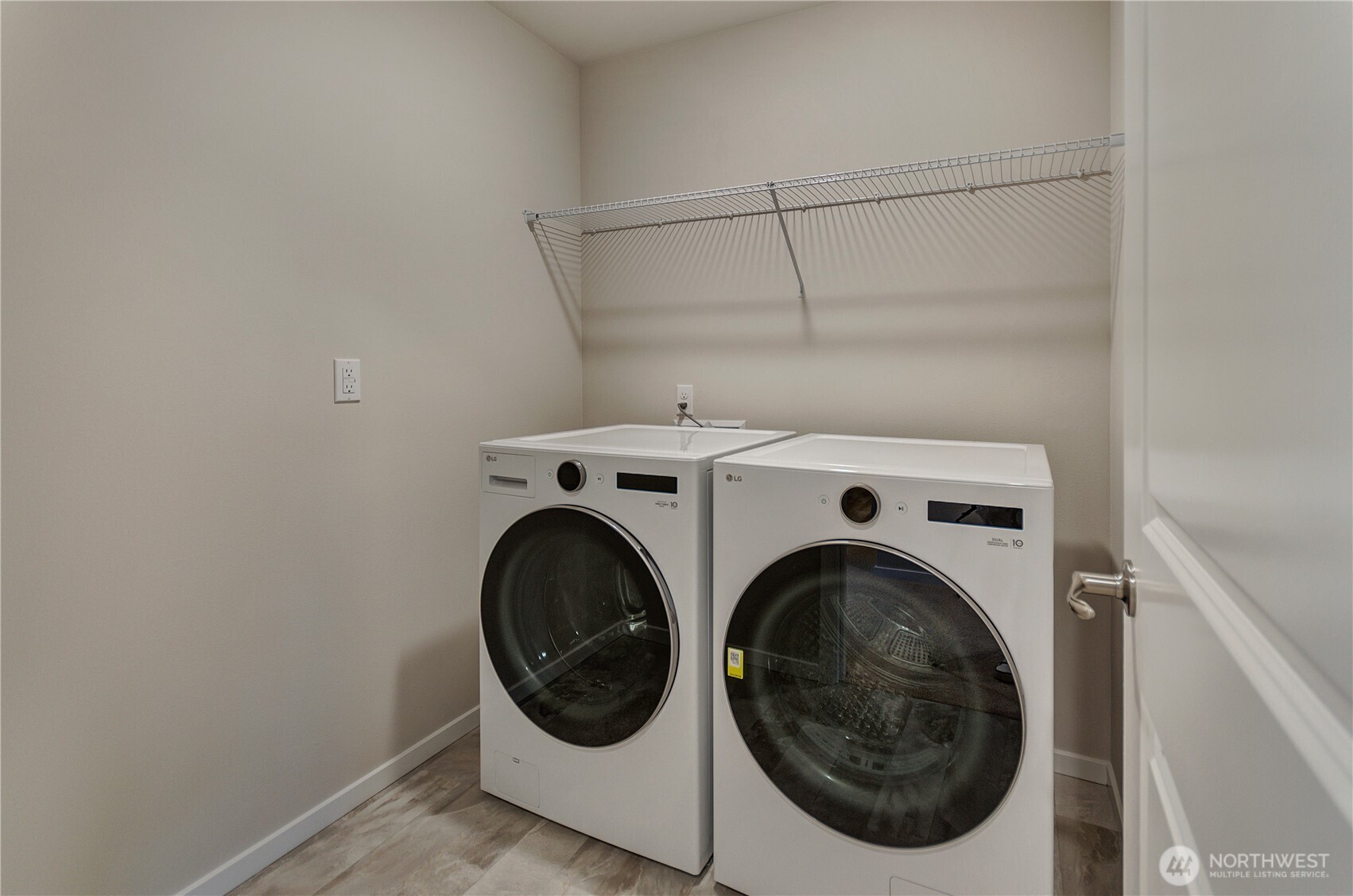 Photos are taken of a Shelby plan previously built in the community.