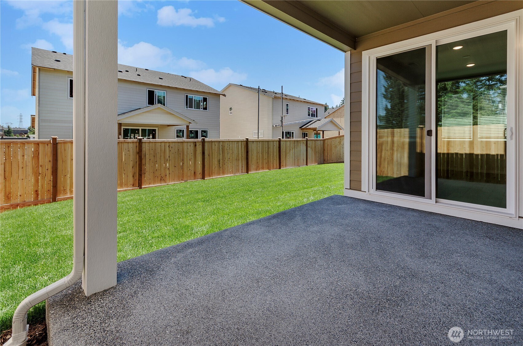 Photos are taken of a Shelby plan previously built in the community.