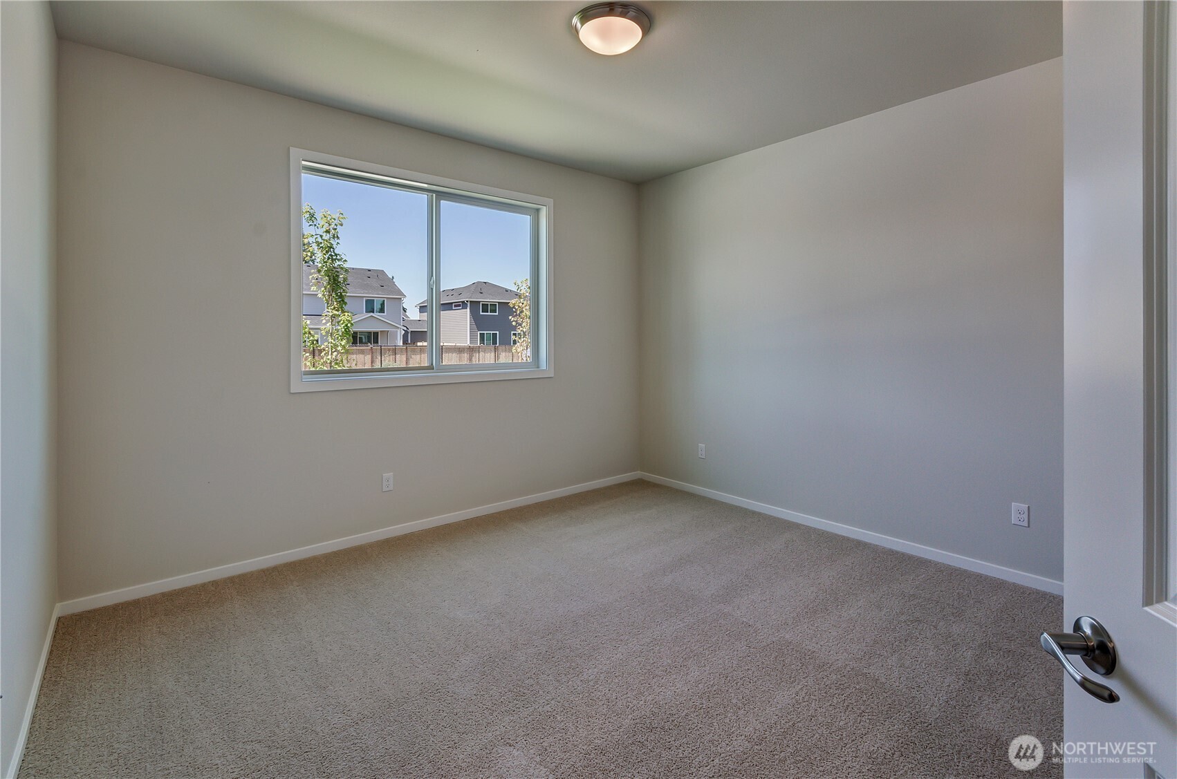 Photos are taken of a Shelby plan previously built in the community.