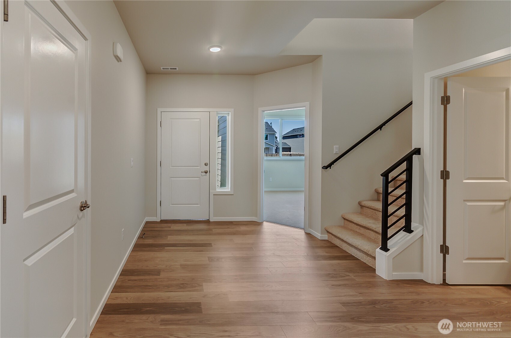 Photos are taken of a Shelby plan previously built in the community.