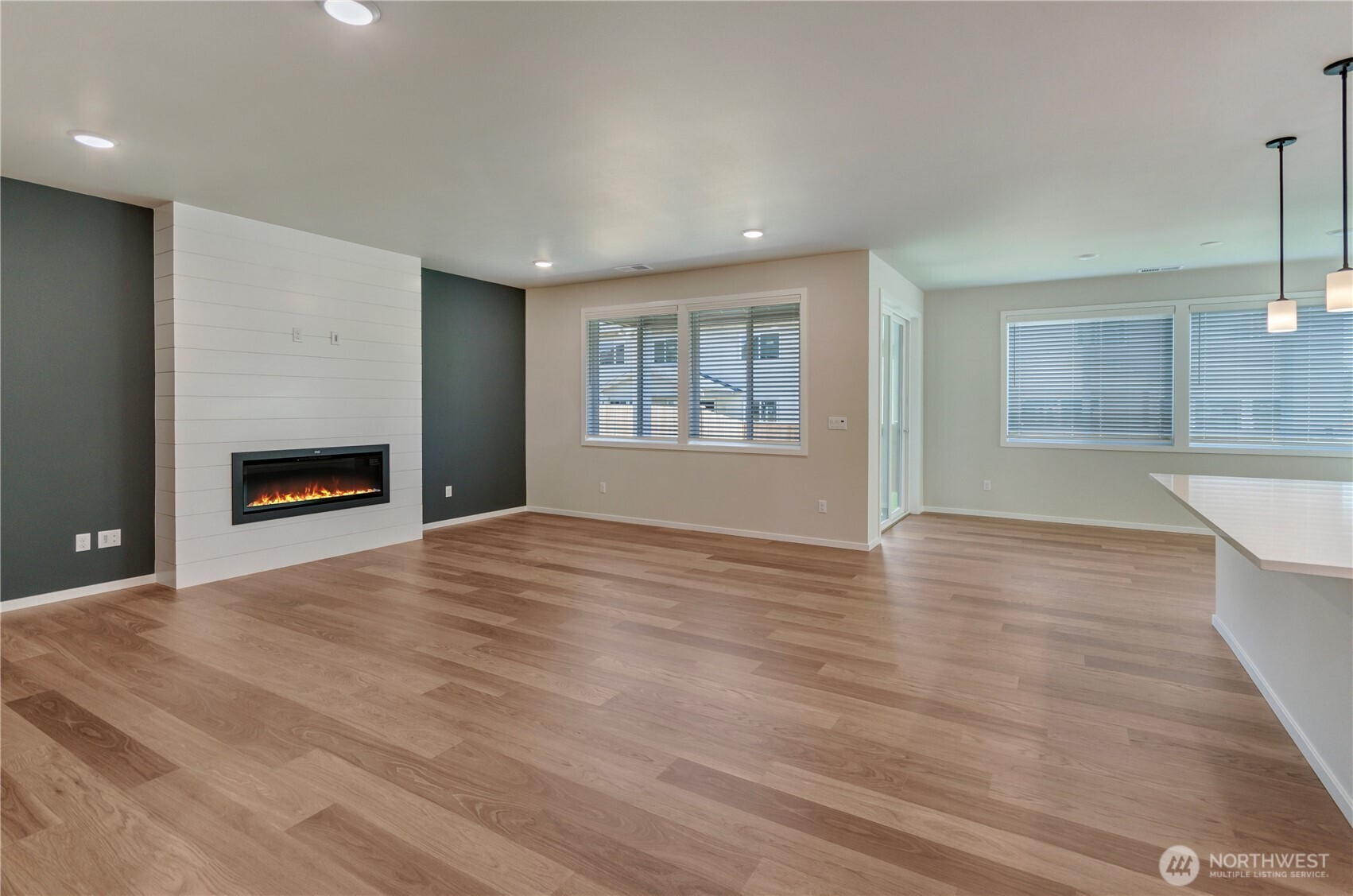 Photos are taken of a Shelby plan previously built in the community.