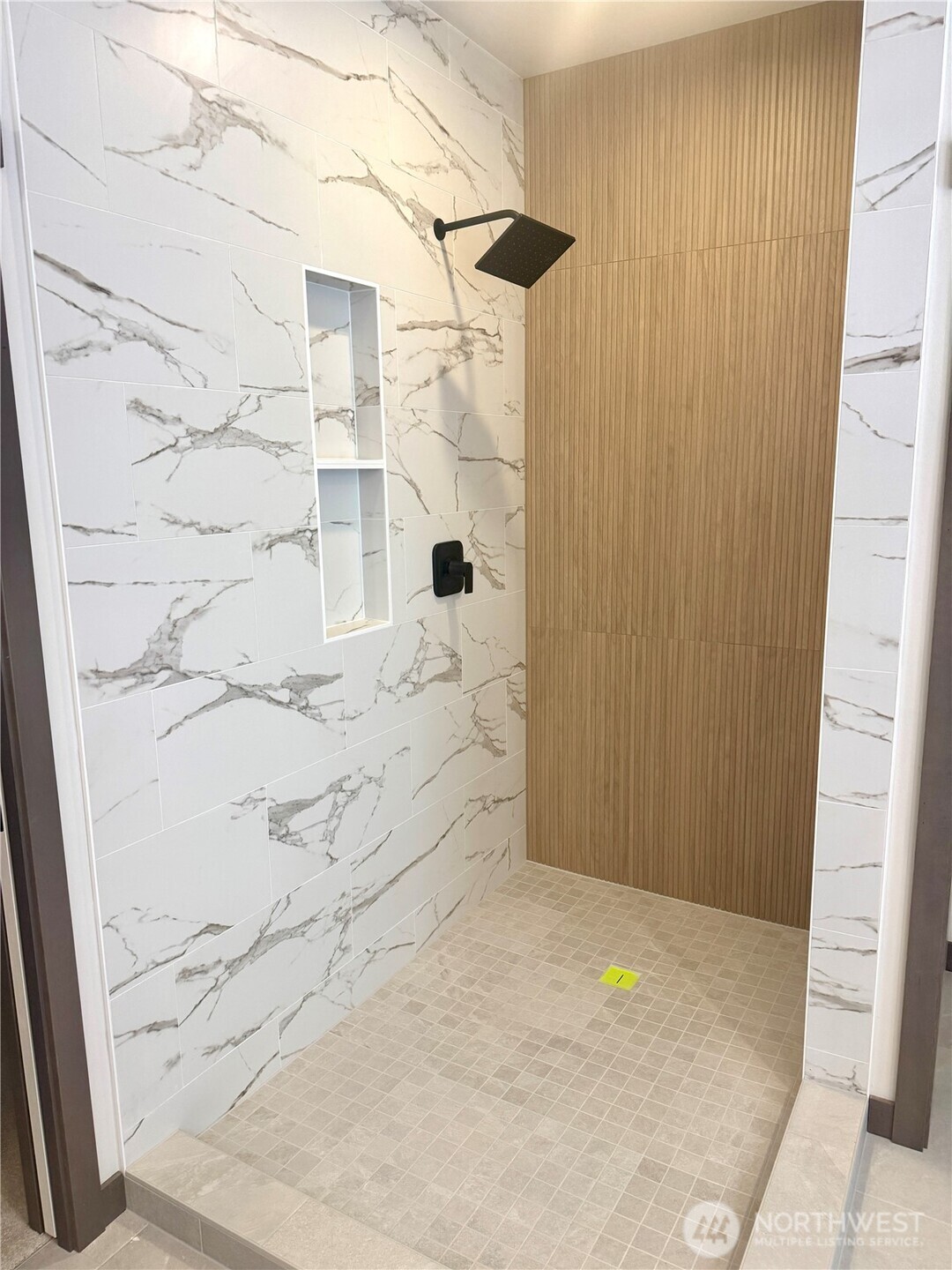 Primary Bath has a wide double vanity with quartz counters and backlit mirrors.