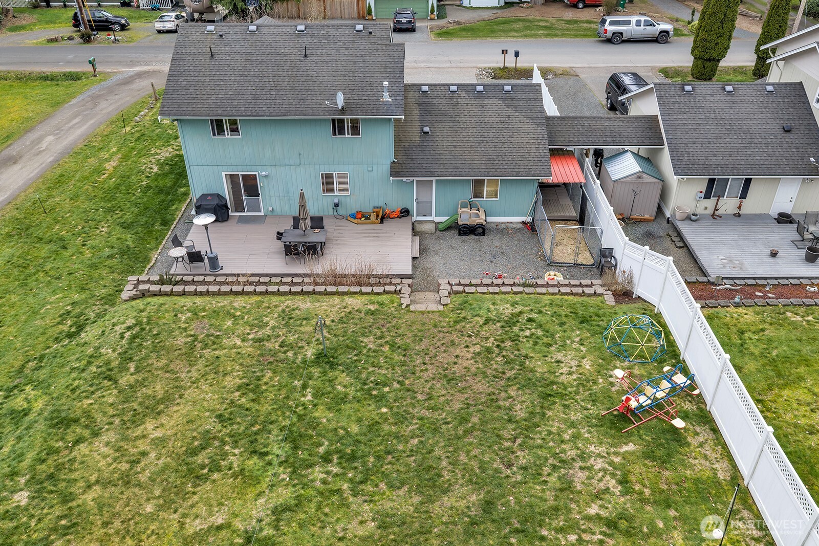 Deck, patio entertaining area and huge yard