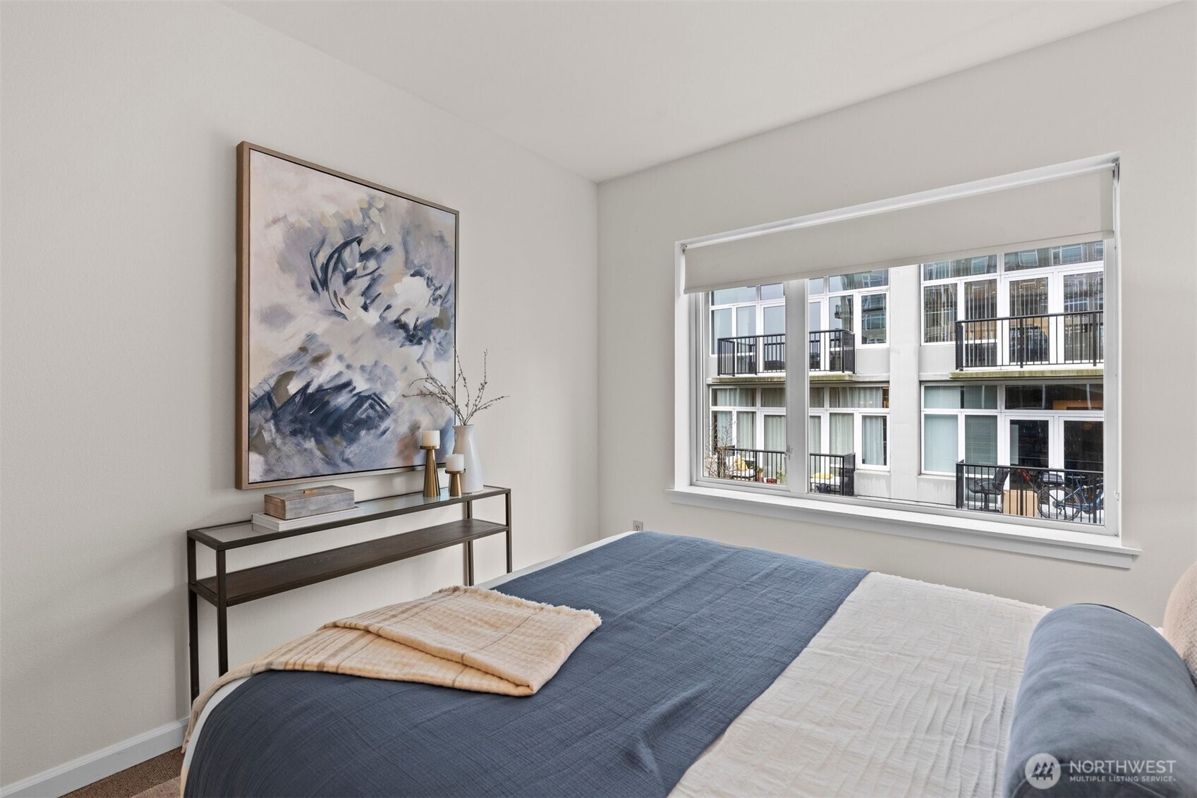 Easily accommodates a queen with side tables.