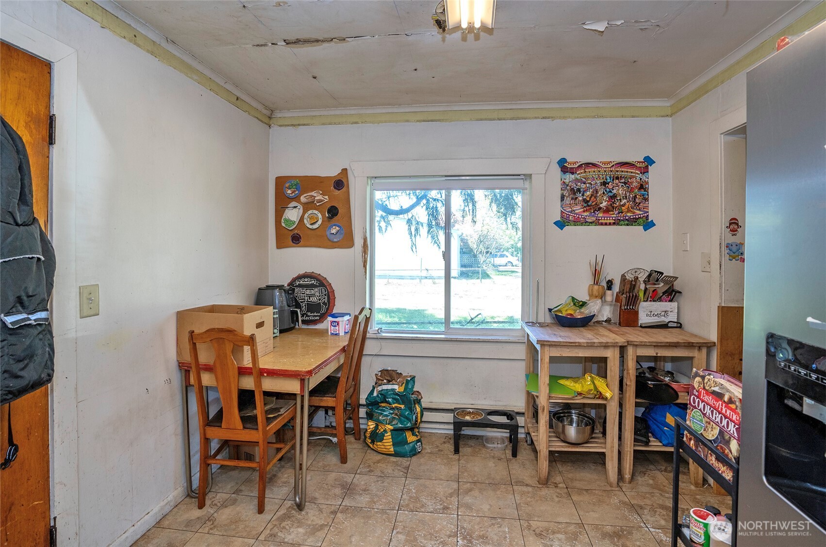 Dining area conveniently located adjacent to the kitchen.