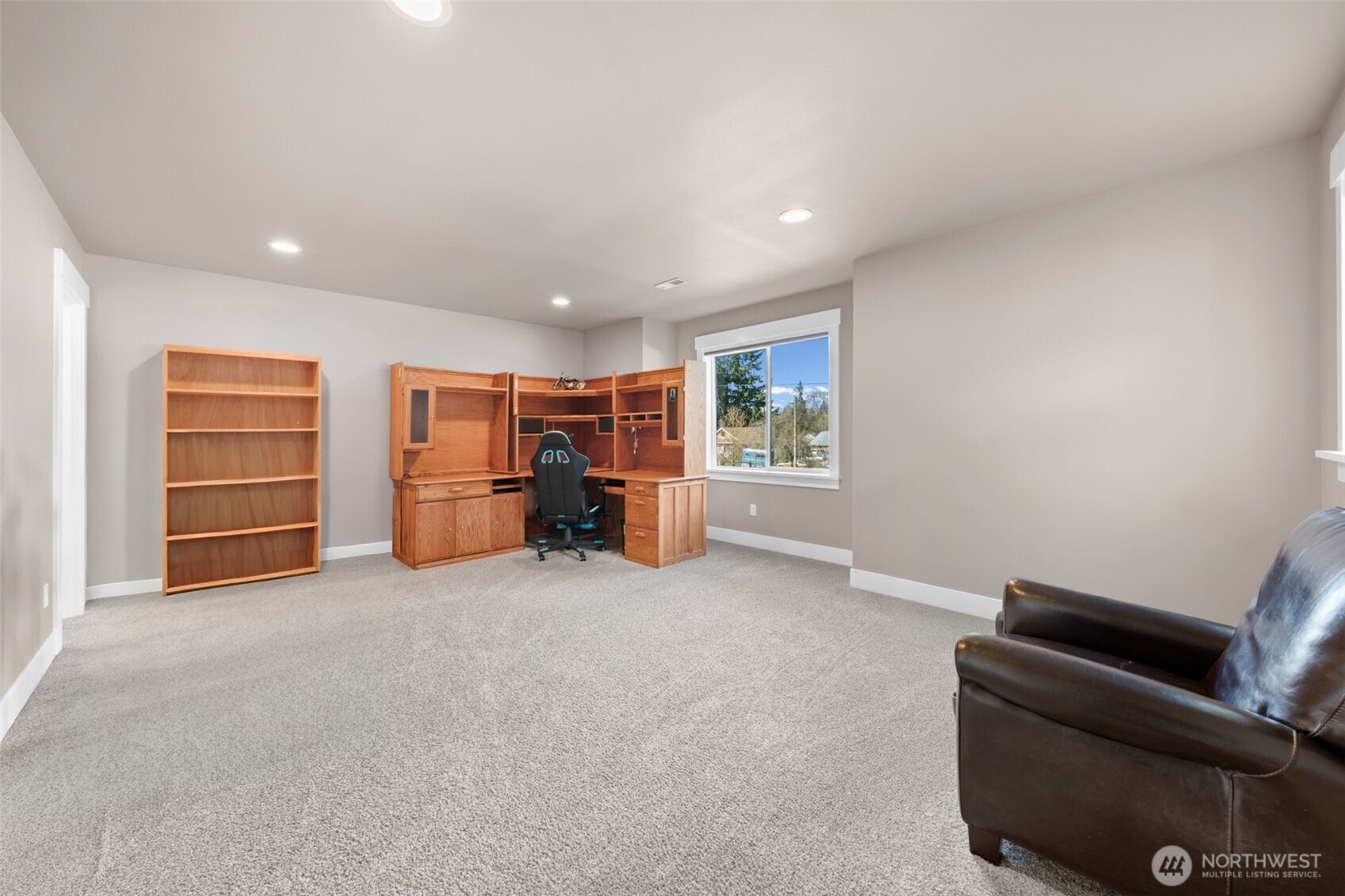 Extra bedroom or office upstairs with private bathroom.