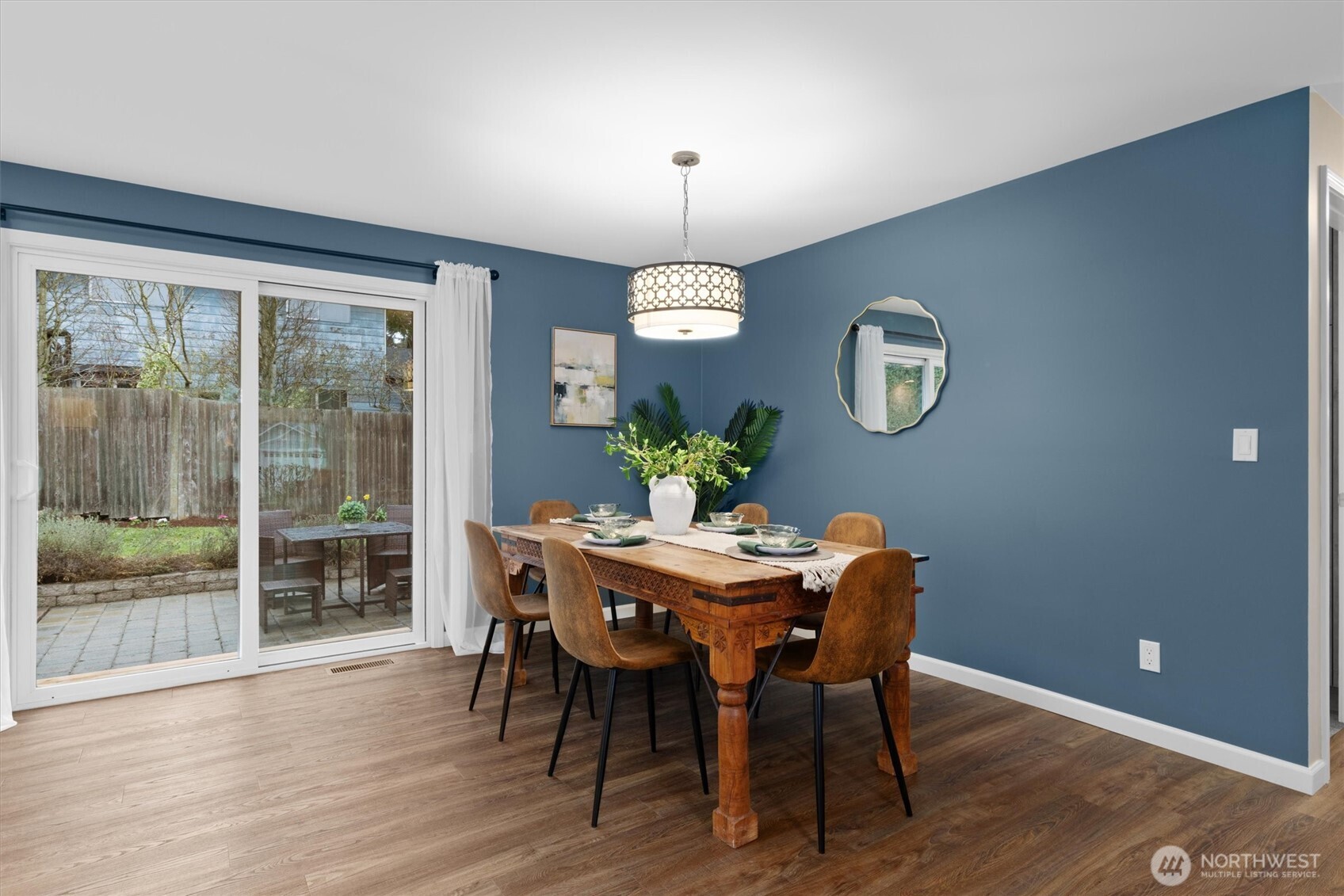 Slider door to backyard patio.