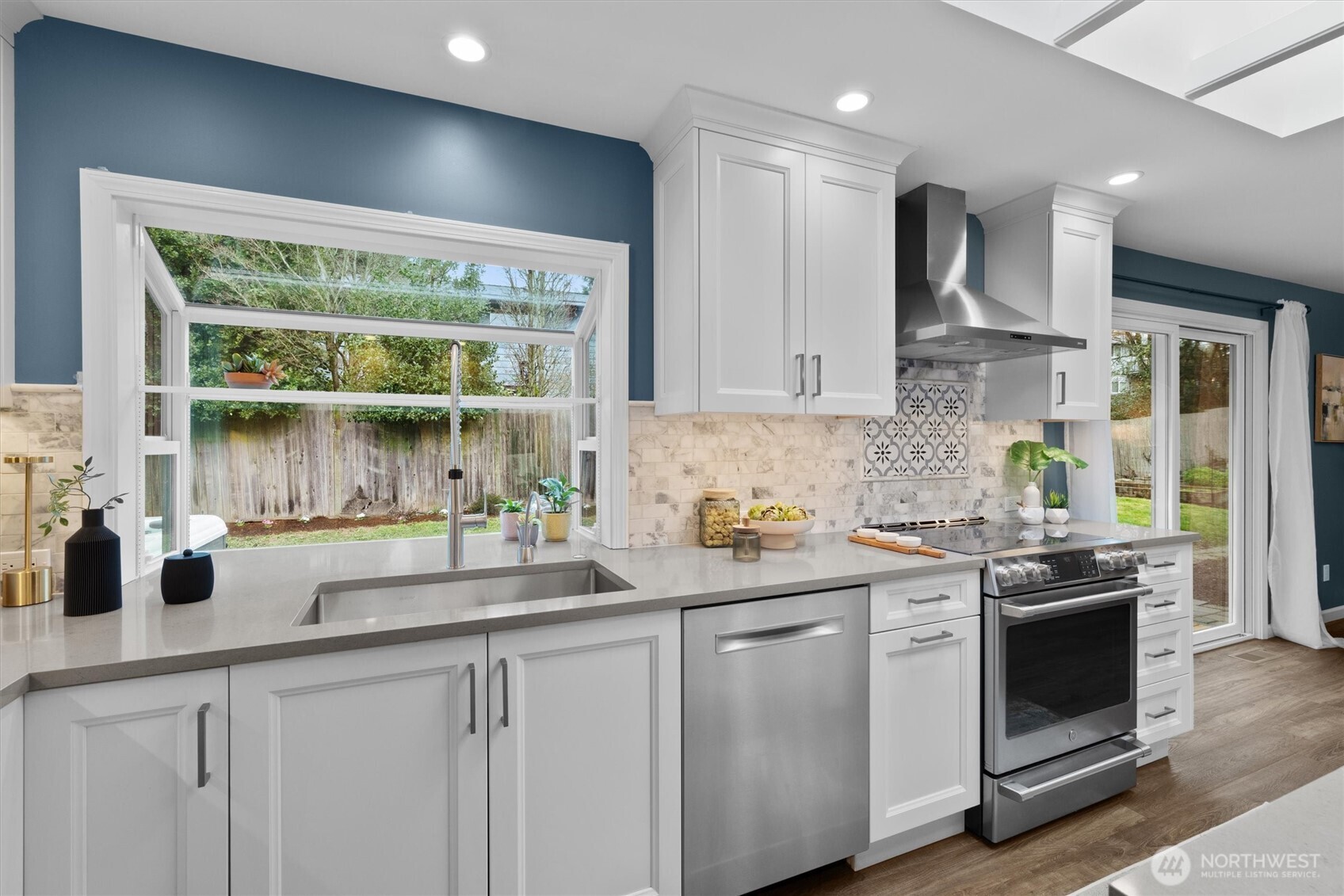 Garden window overlooking backyard.