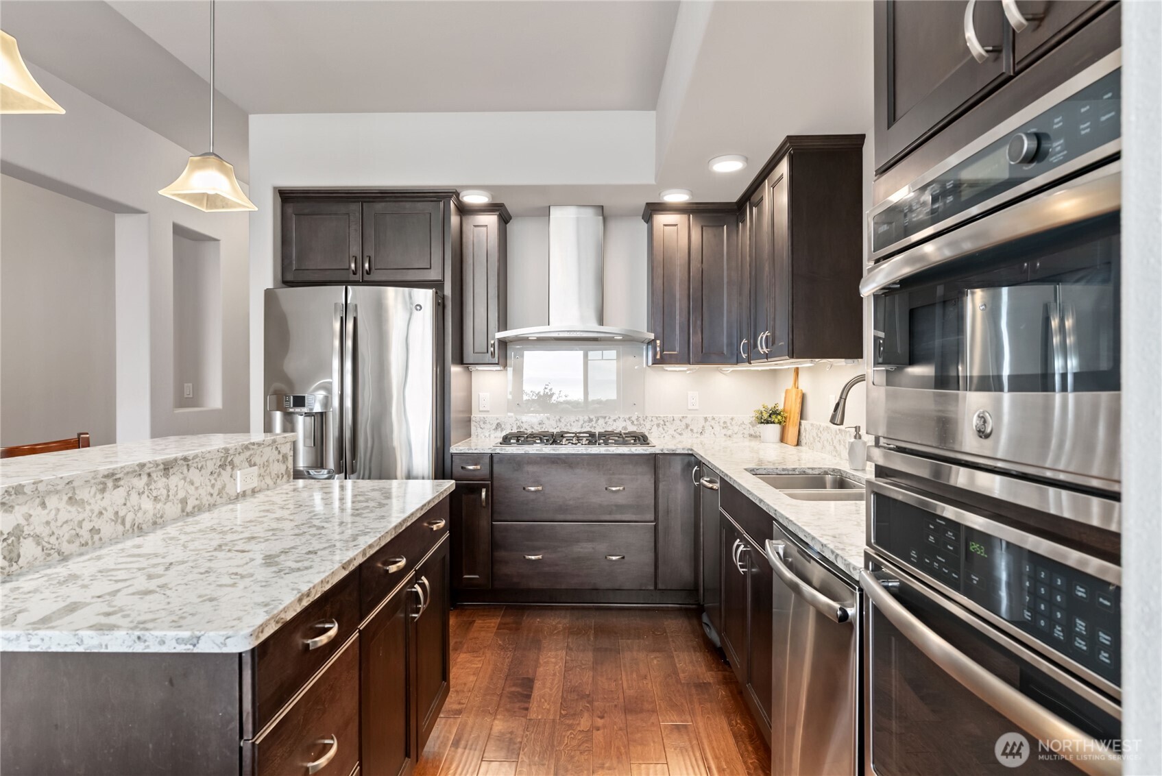 Upgraded stainless steel appliances. Upgraded counter gas stovetop and wall oven.