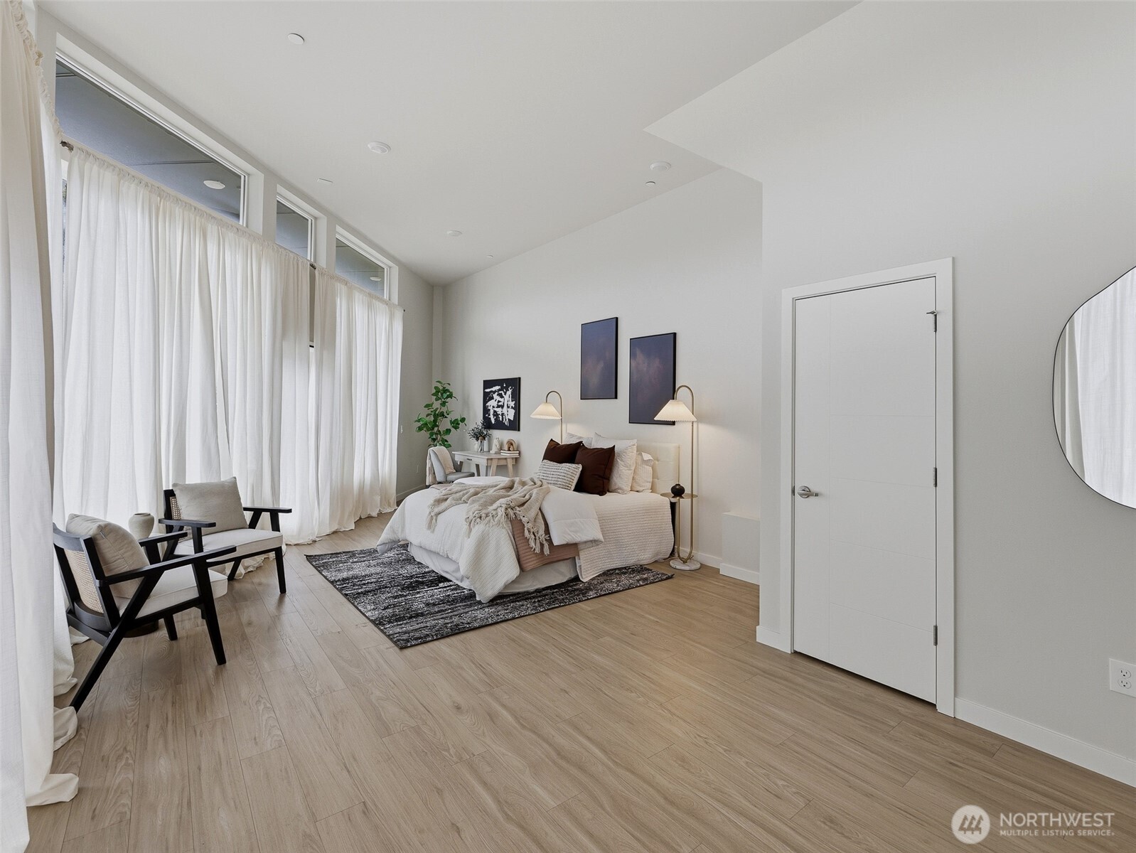 The live/work space offers flexibility as a third bedroom, home office, or client-facing business