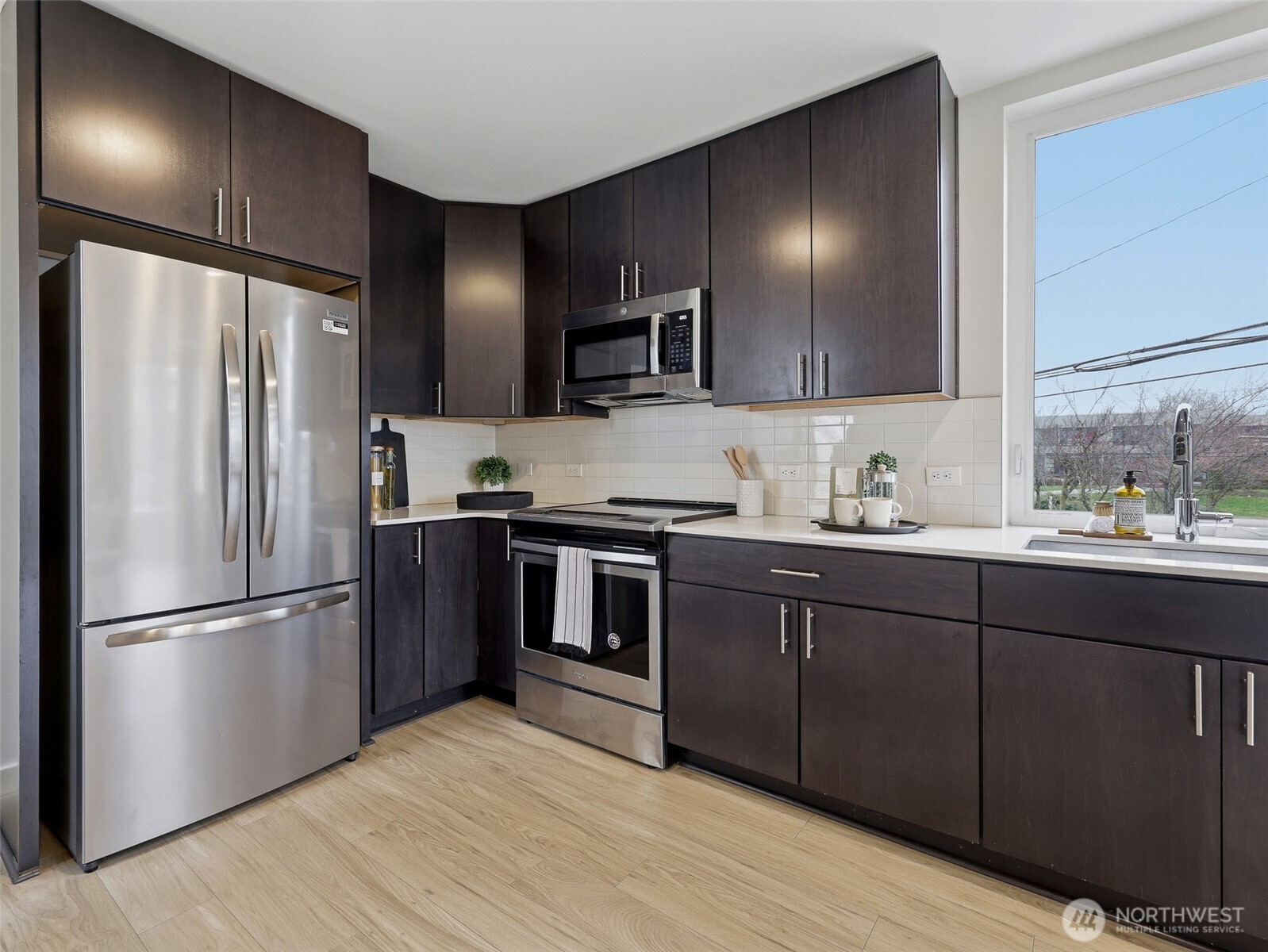 Your plants will love the sunny window over the kitchen sink