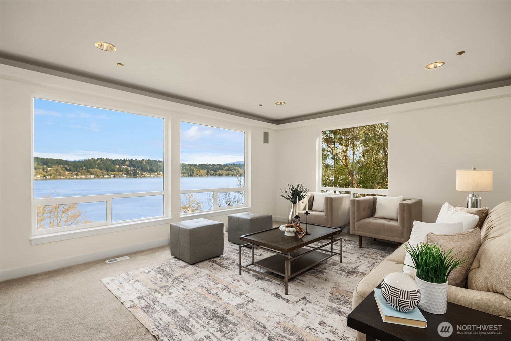 Wow! Full lake Sammamish view from the main floor living area. Fresh paint and carpets throughout.