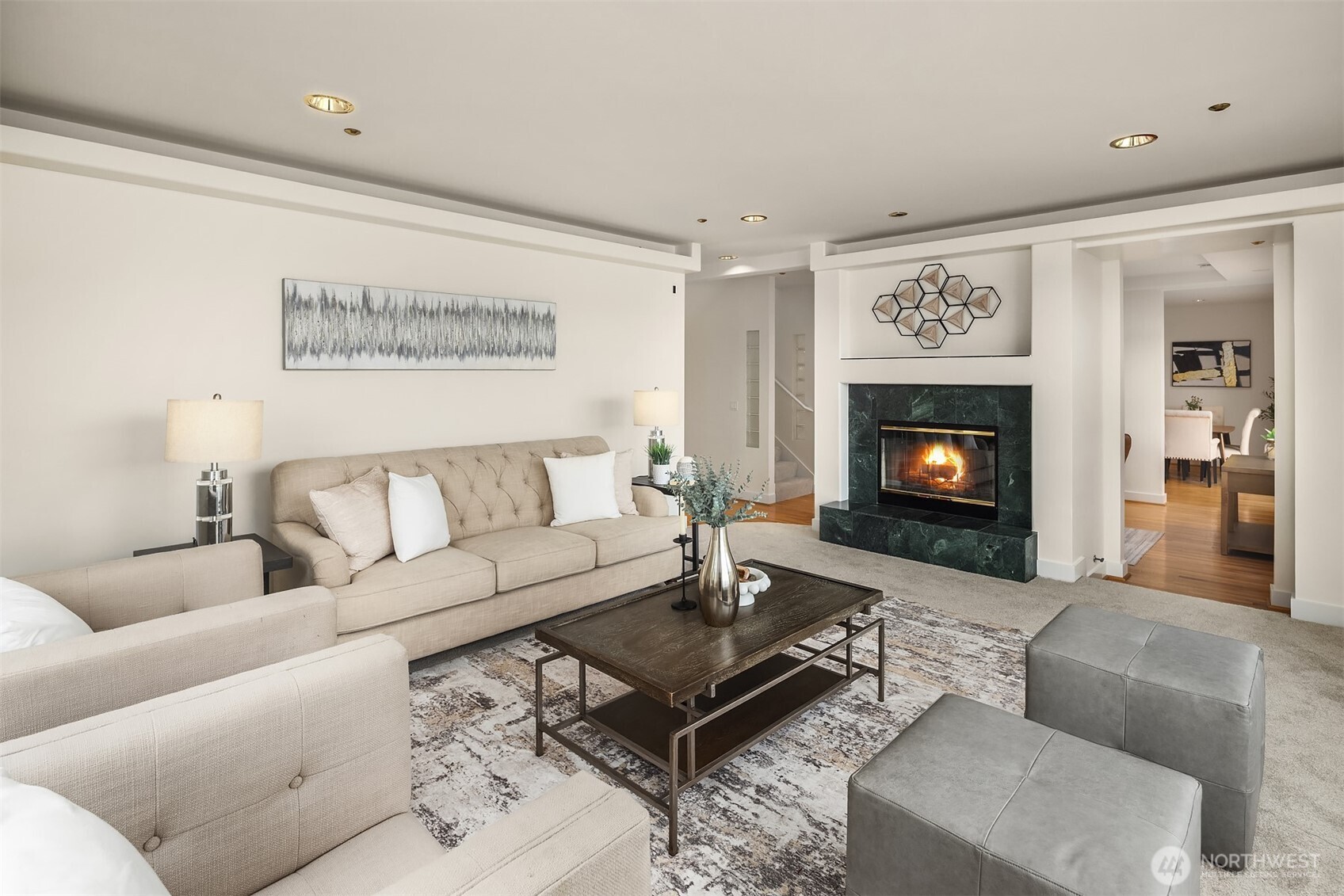 The living room is nice and roomy, with high ceilings. Keep floor plan as is, or open it up for a wow factor Great Room that takes full advantage of the view.