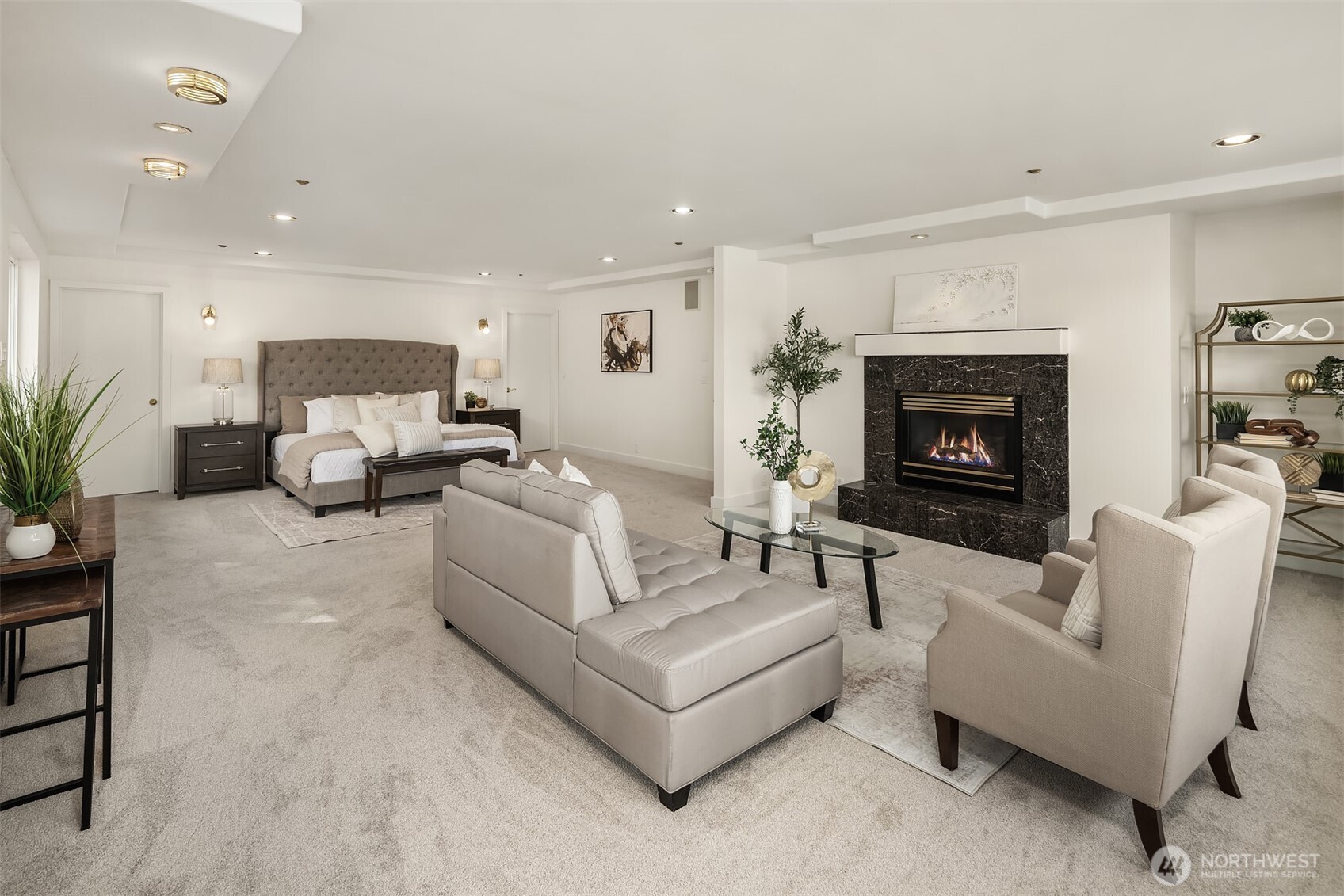 An incredible primary suite with stunning lake views