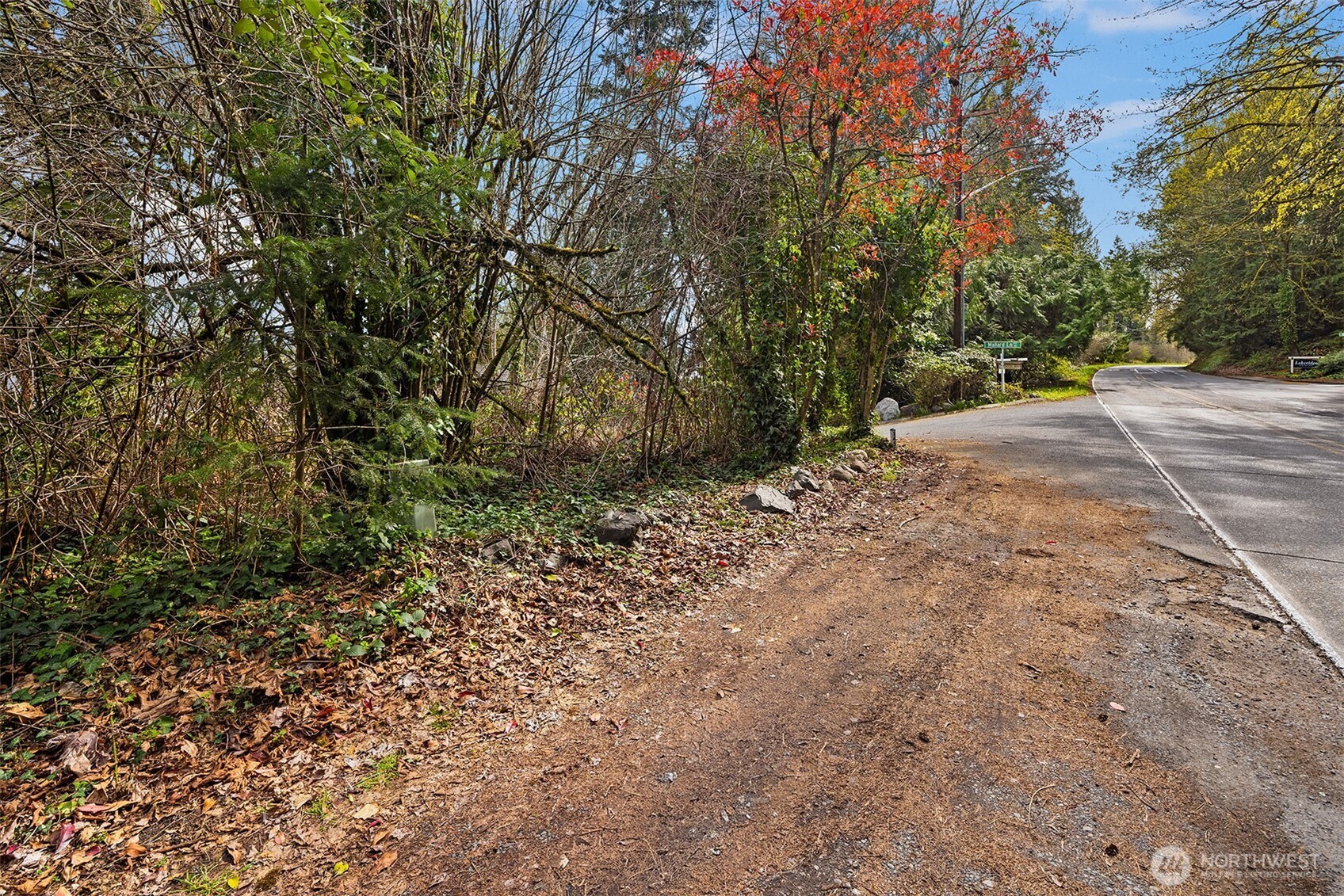 The property includes boat/trailer parking space on West Lake Sammamish Parkway, on the north side of Mallard Lane