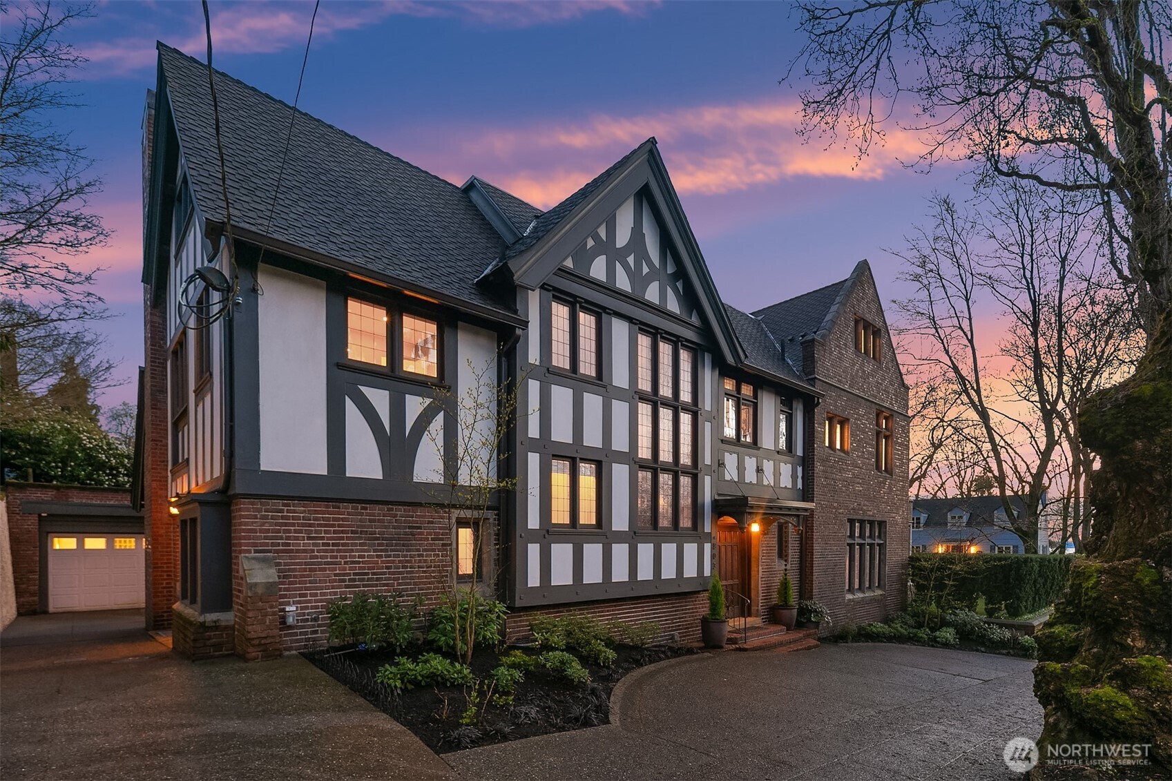 An elevator connects the first and second floors. All lighting throughout the home is LED, with smart dimming and Z-Wave app control. In addition to an over-sized one car garage, there is ample off-street parking. Multiple laundry facilities are located in the home - the basement as well as on the second and third floors.