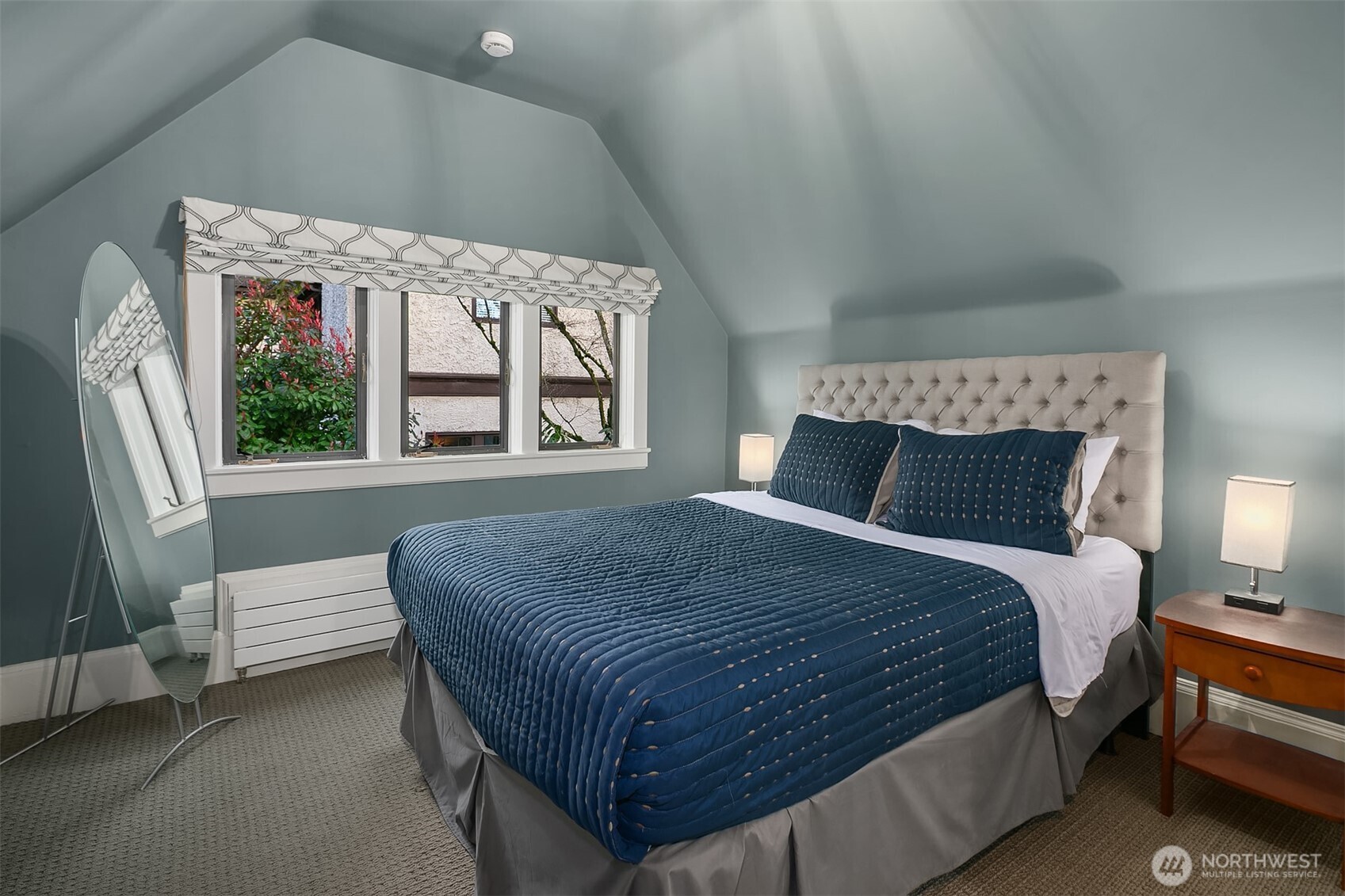 Bedroom #5 is located on the top level of the home. A mini-split keeps the room cool during the summer.