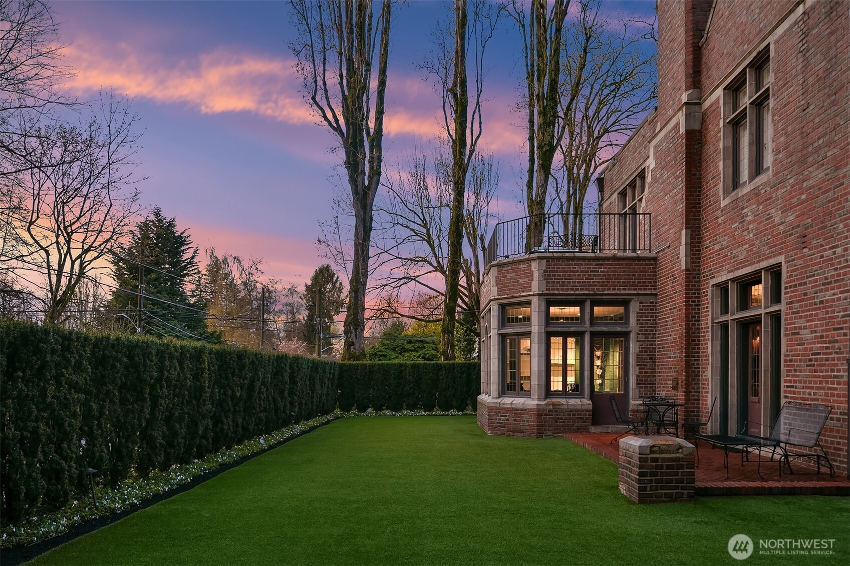The patio area is surrounded by low maintenance gardens. A built-in sprinkler system is complete with a smart irrigation controller.
