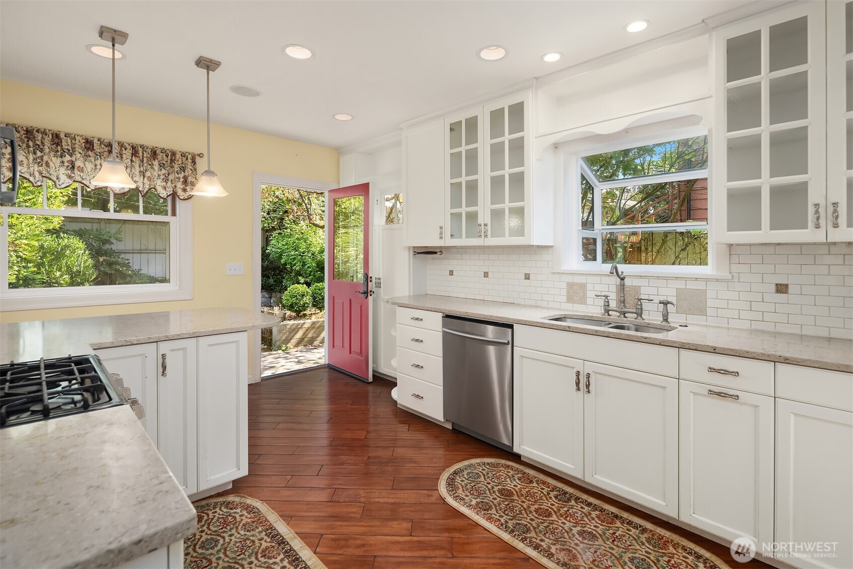 Ktichen opening to backyard patio