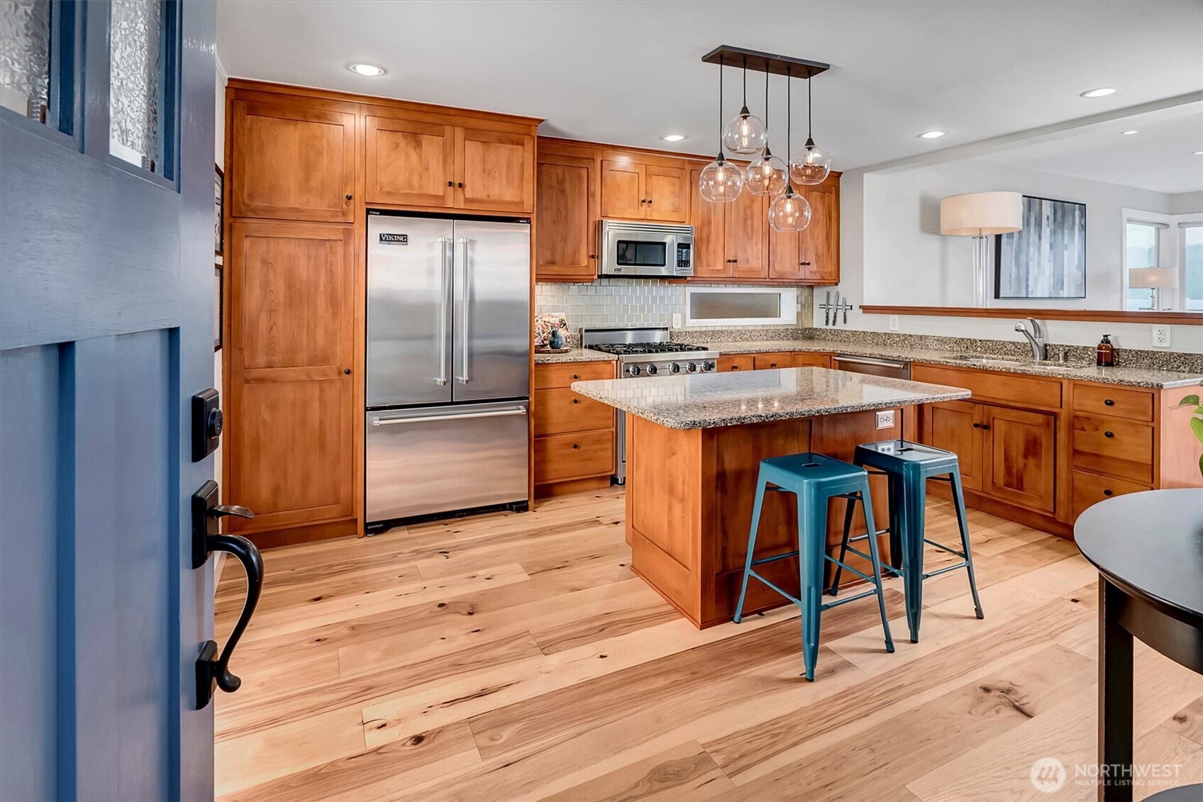Enter into stunning kitchen open to main living area