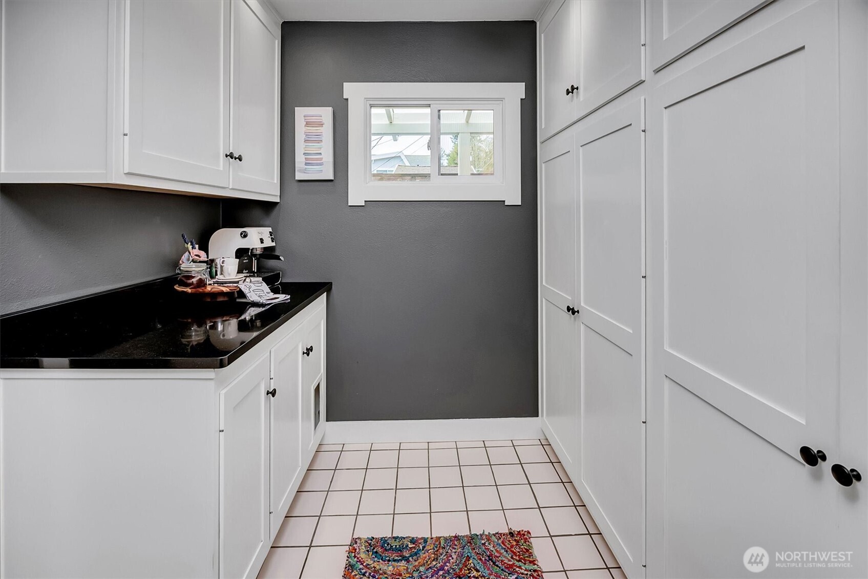 Coffee bar and extra storage adjacent to kitchen