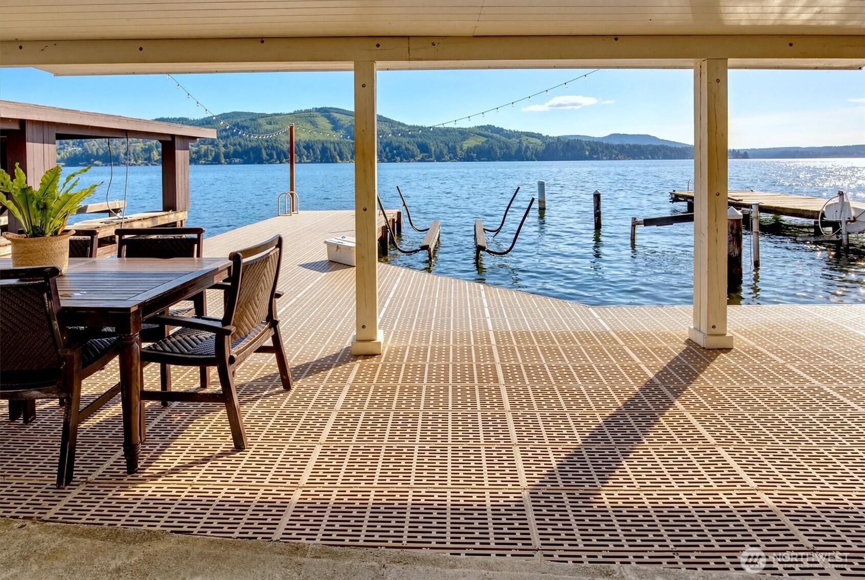 Primary closet with tons of extra storage behind the mirror