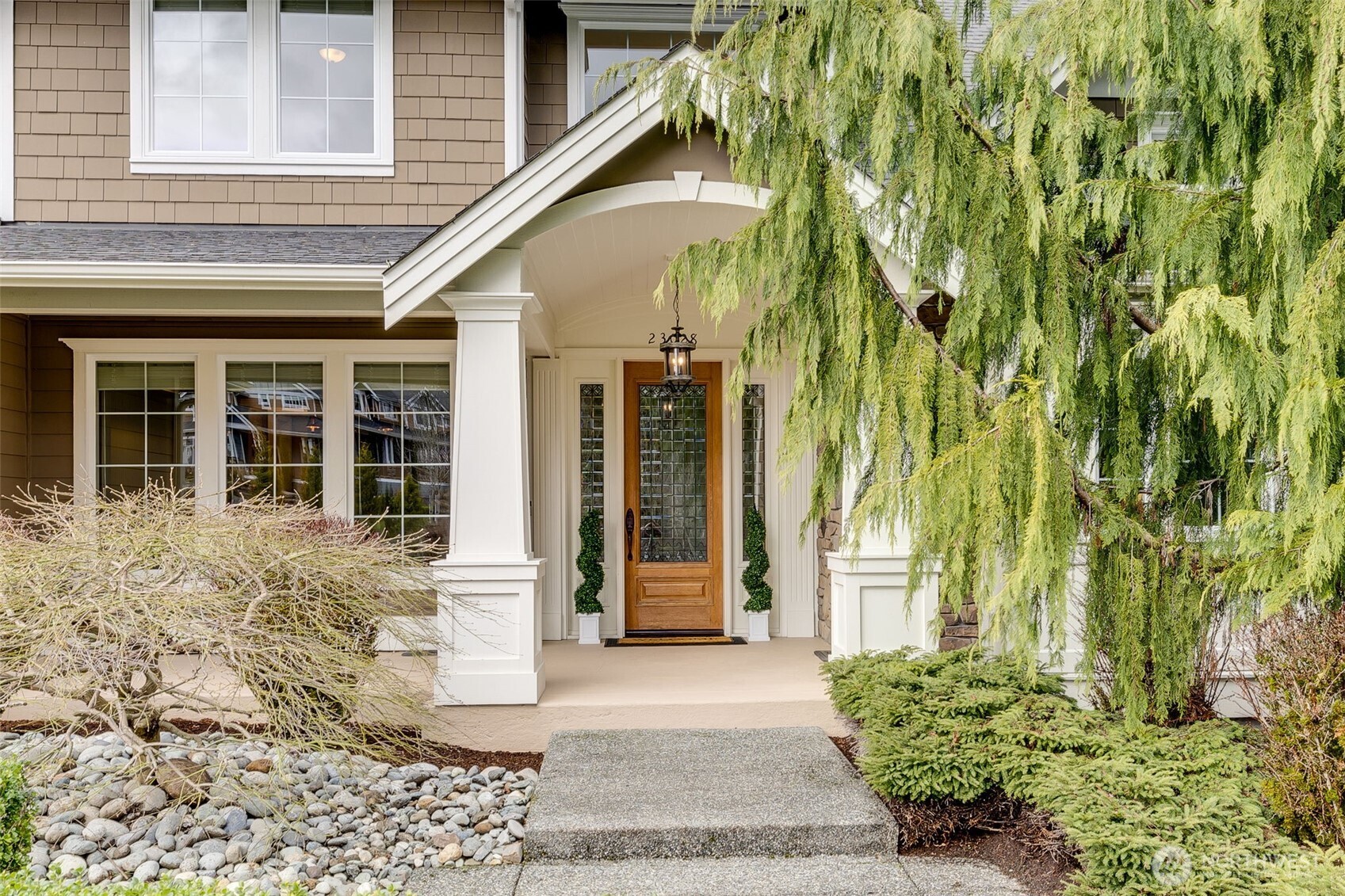What a welcoming porch to greet visitors in your lovely new home.