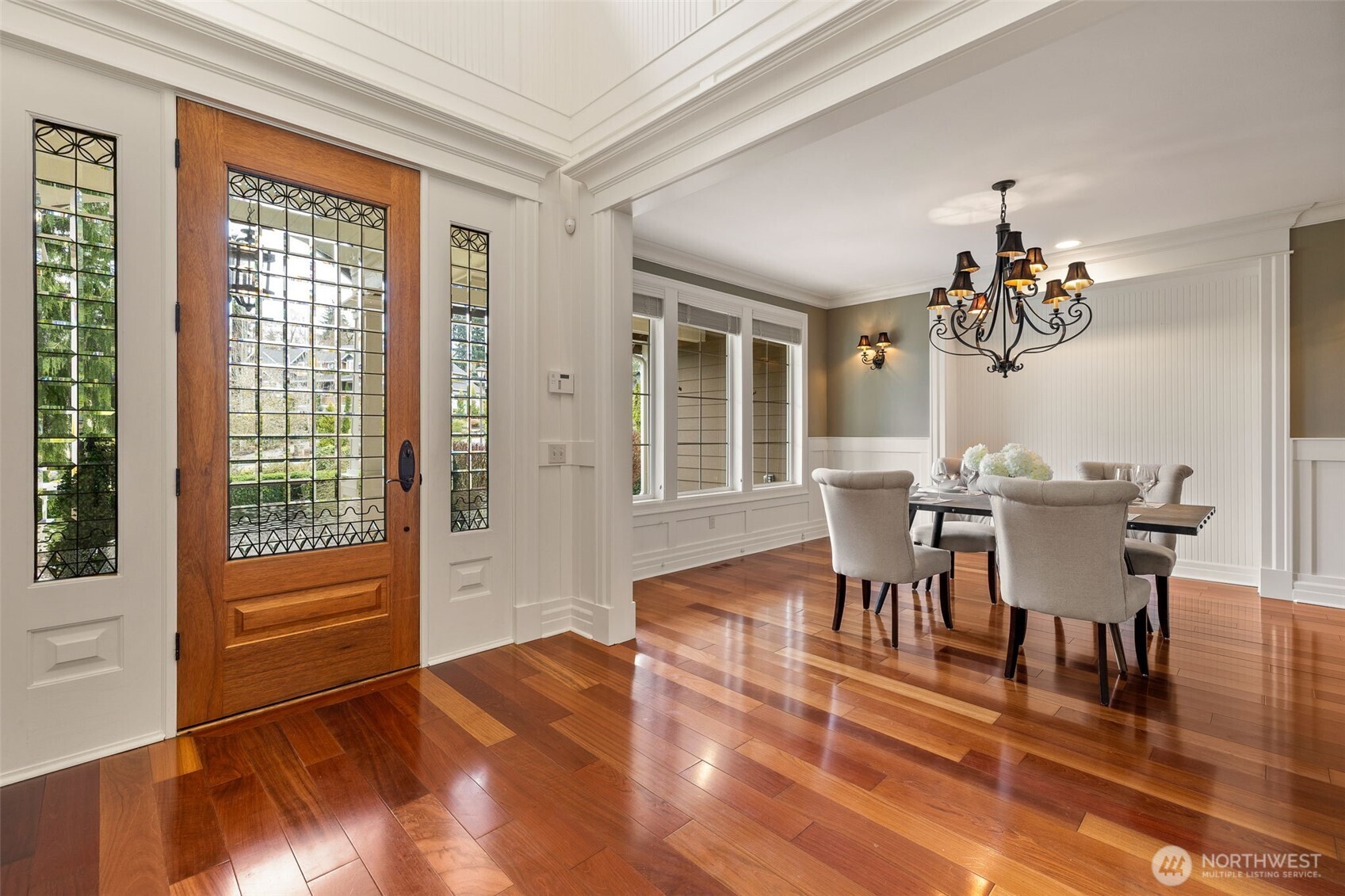 The first impression is this lovely stained glass entry door.