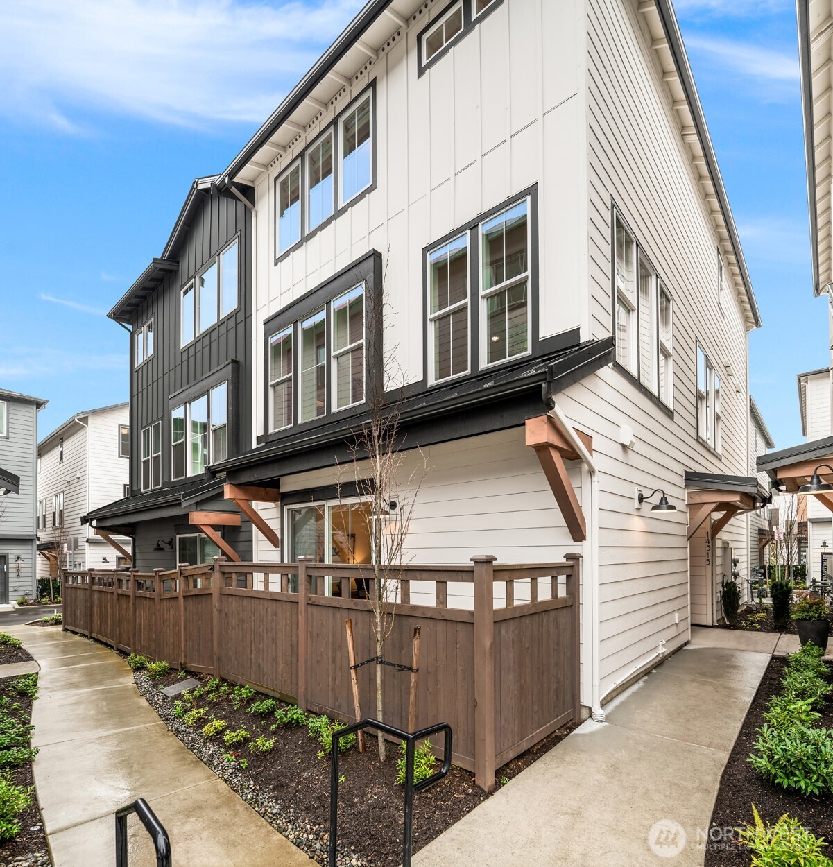 Private side patio space perfect for relaxing or outdoor dining.