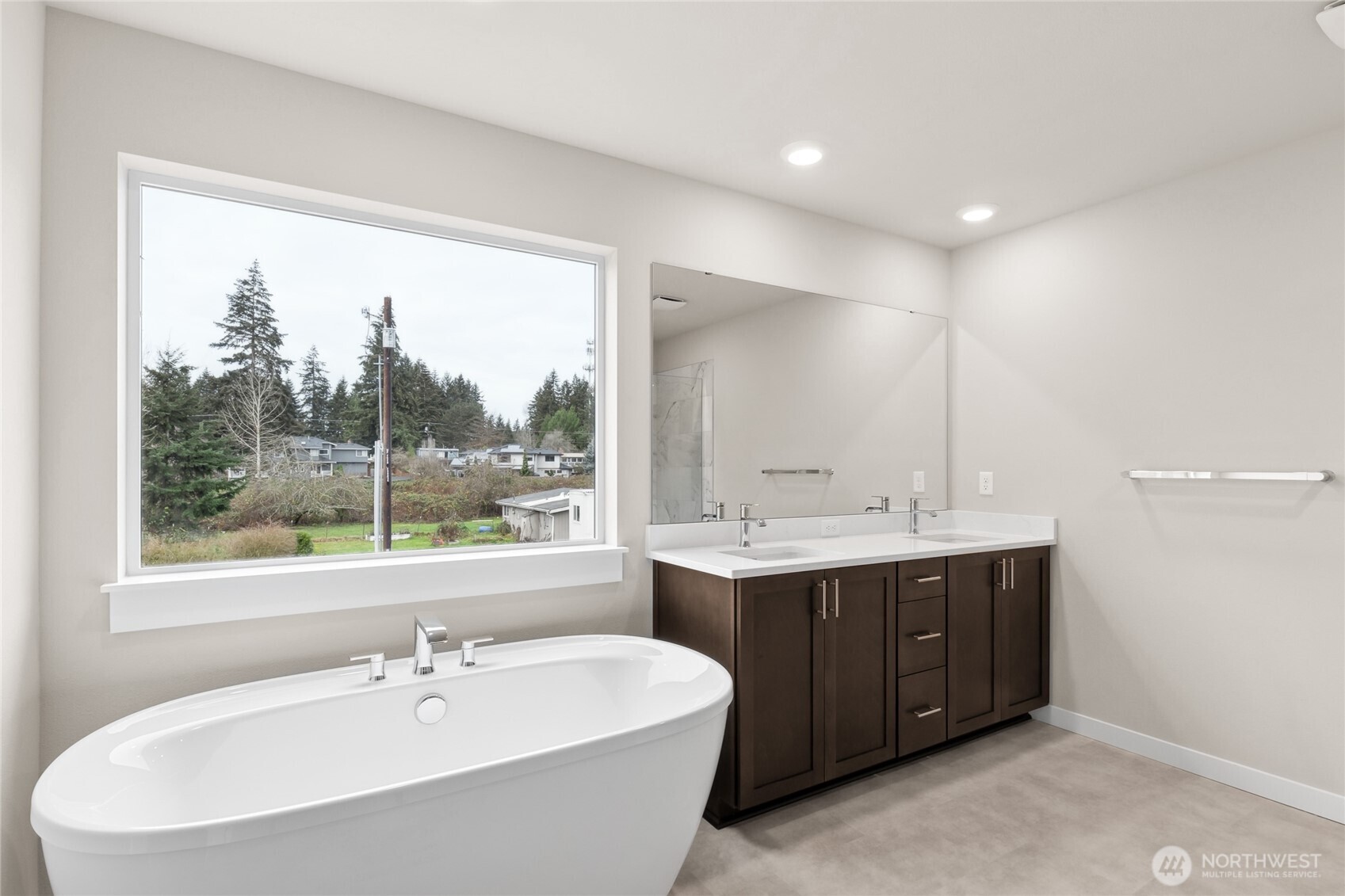 Primary bath showing another location within community - Home for sale will include white cabinetry.