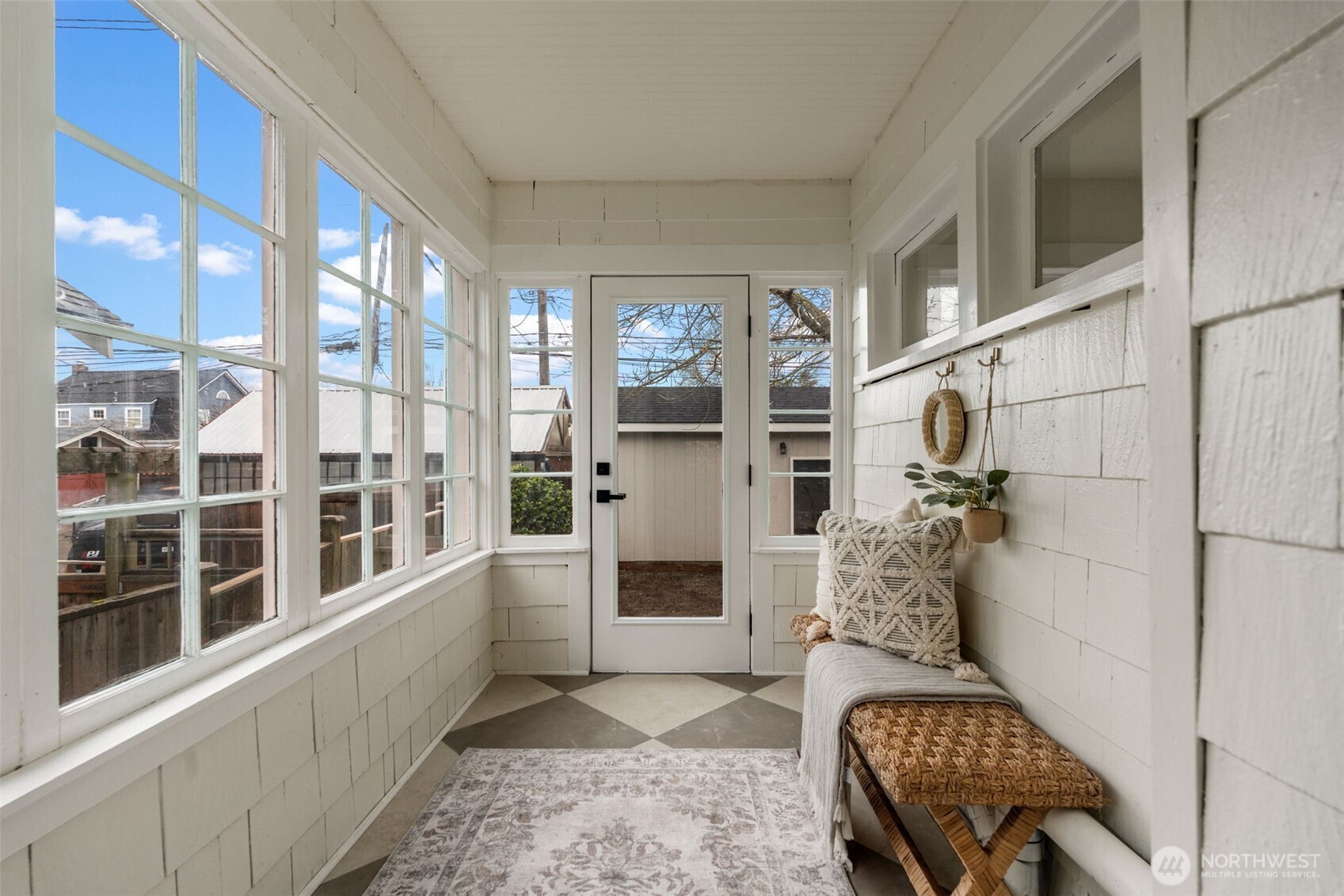 Mudroom off the Kitchen leads to backyard