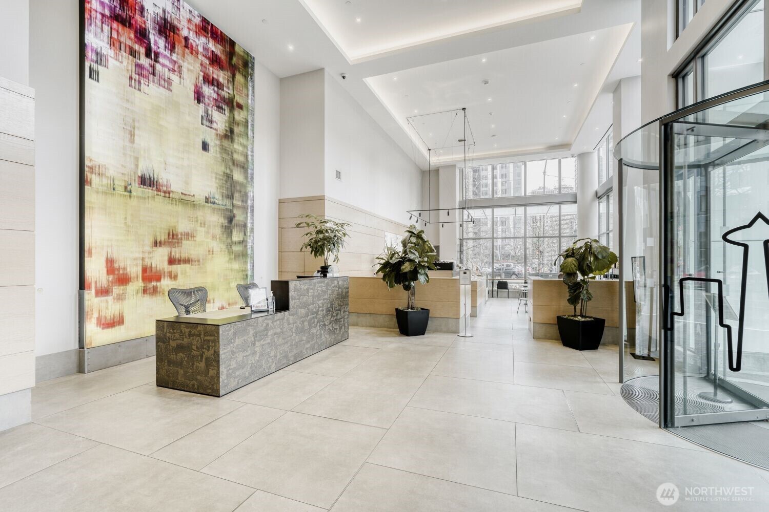 Main lobby, concierge desk, coffee shop in back