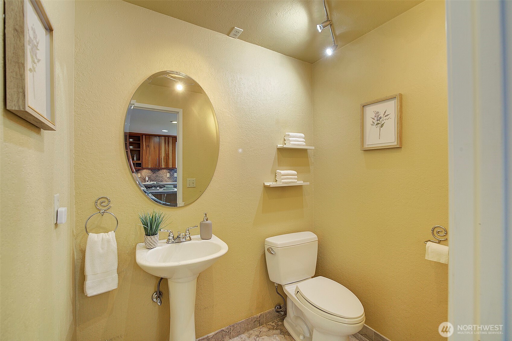 A powder room is featured on the main floor.