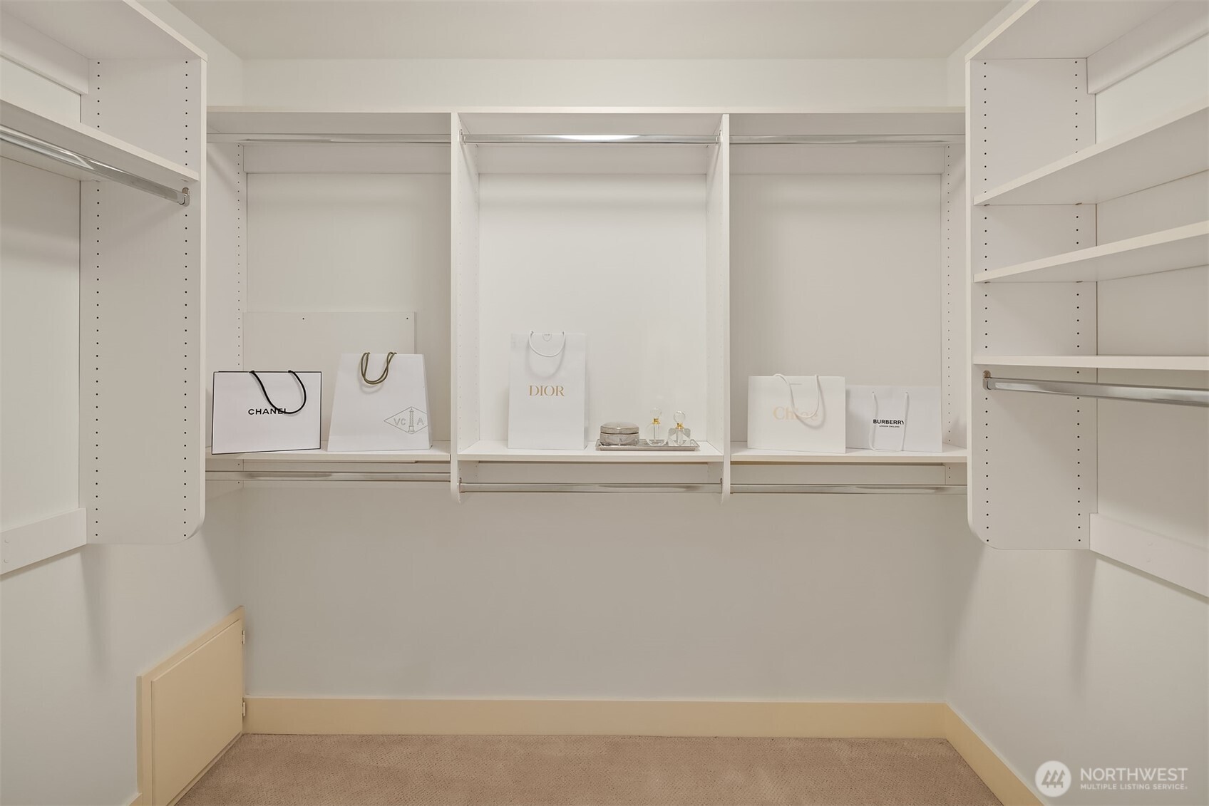 This walk-in closet completes the primary suite.