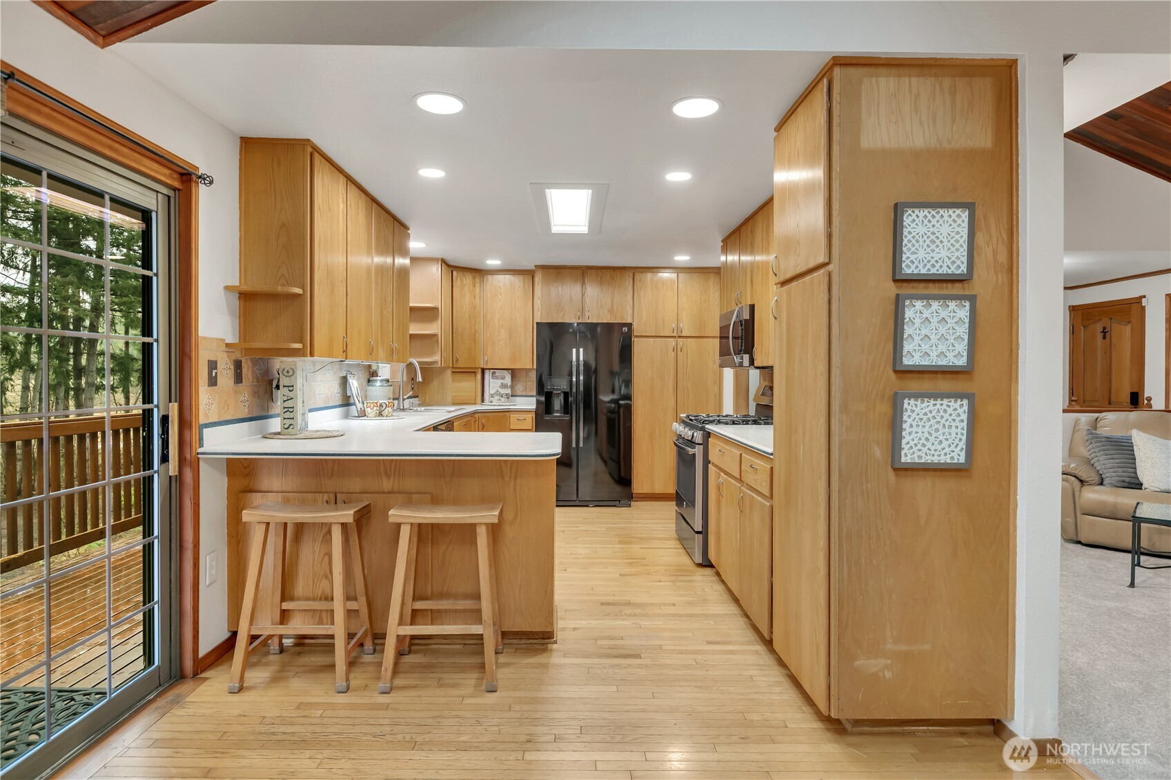 Custom cabinets with pullouts and a solid surface Corian style countertop...