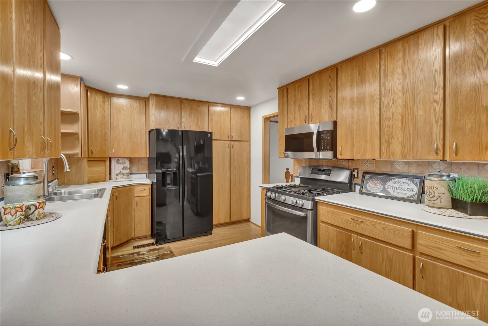 The roll out pantry is the the right of the refrigerator...