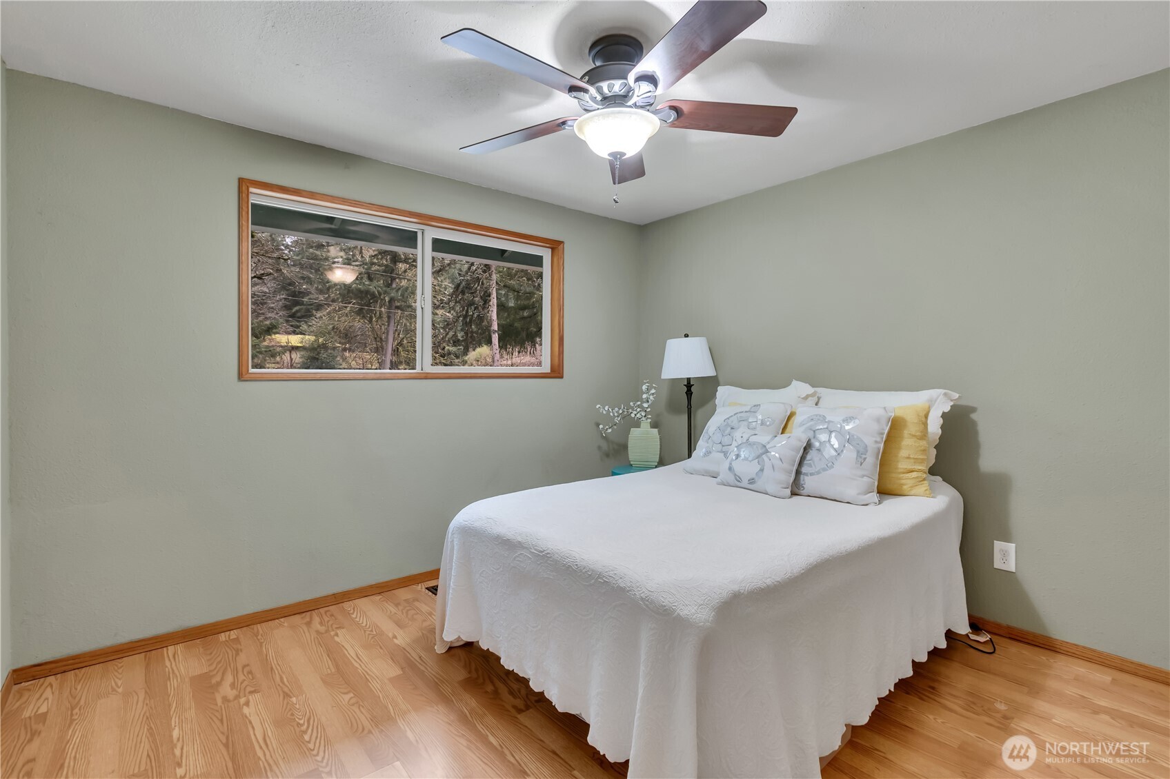 The main bath has custom lighting and a full tub/shower glass enclosure!
