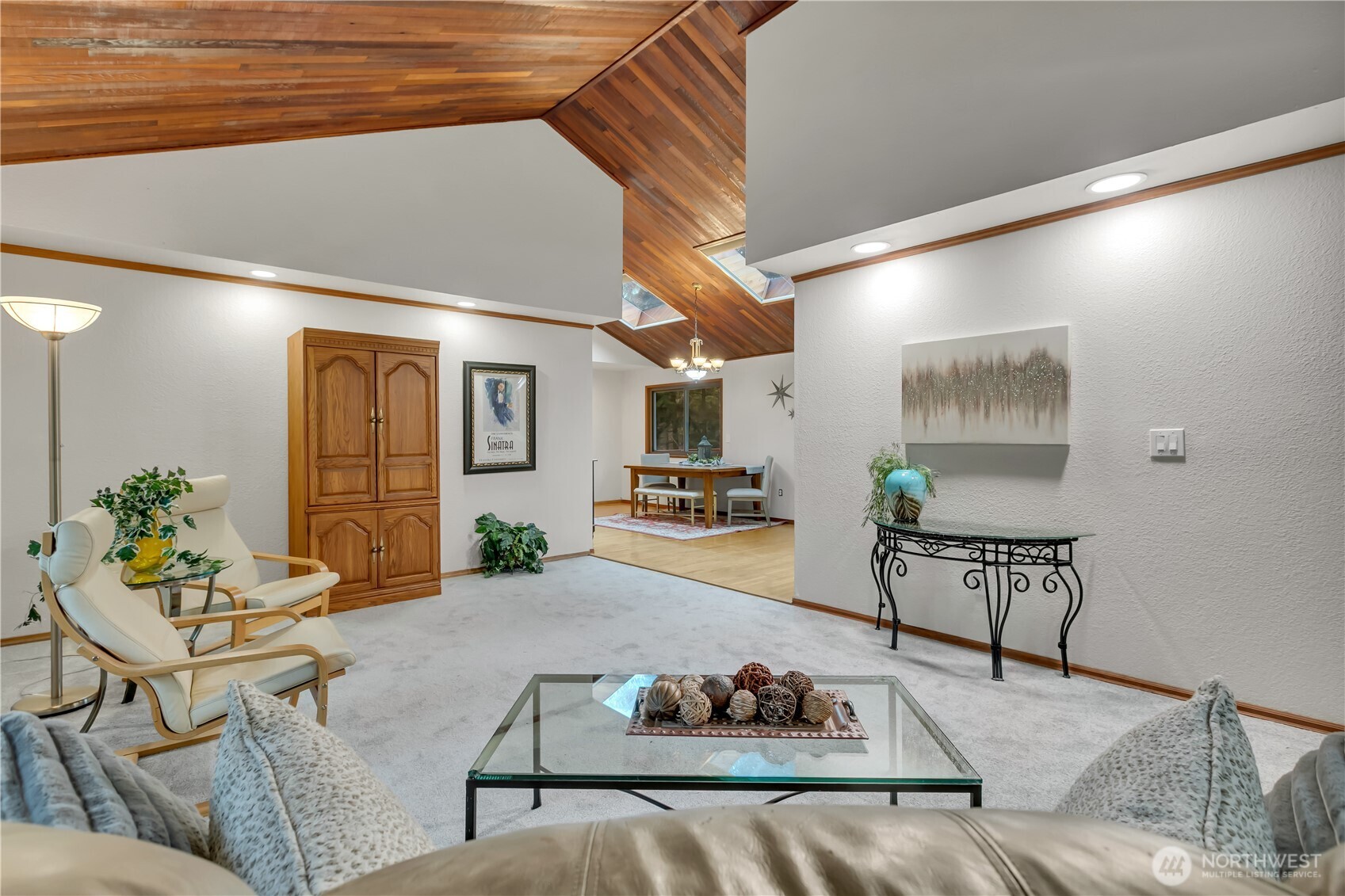 Large open floor plan and dramatic ceilings...skylights let the "sun shine in"!