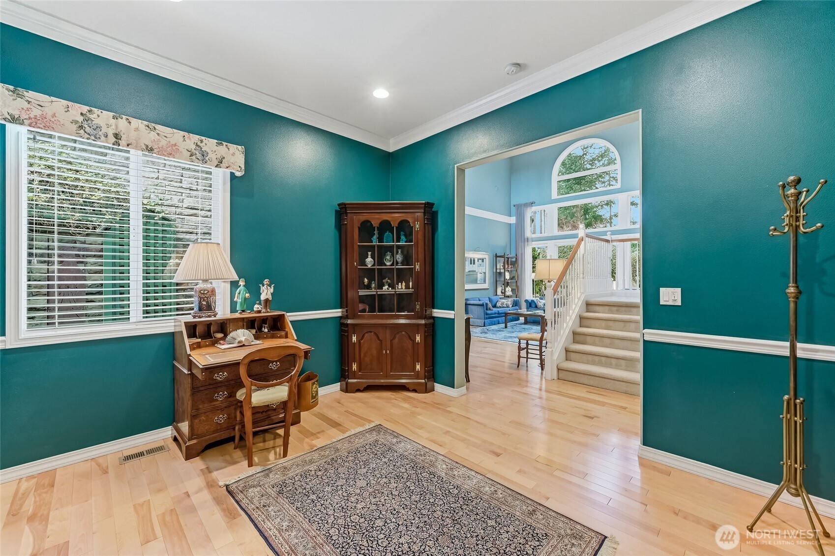 The kitchen is a chef's dream; an abundance of cabinets with under cabinet lighting and lowers with pull-out shevles. Ample counter space, double ovens and a gas cooktop.