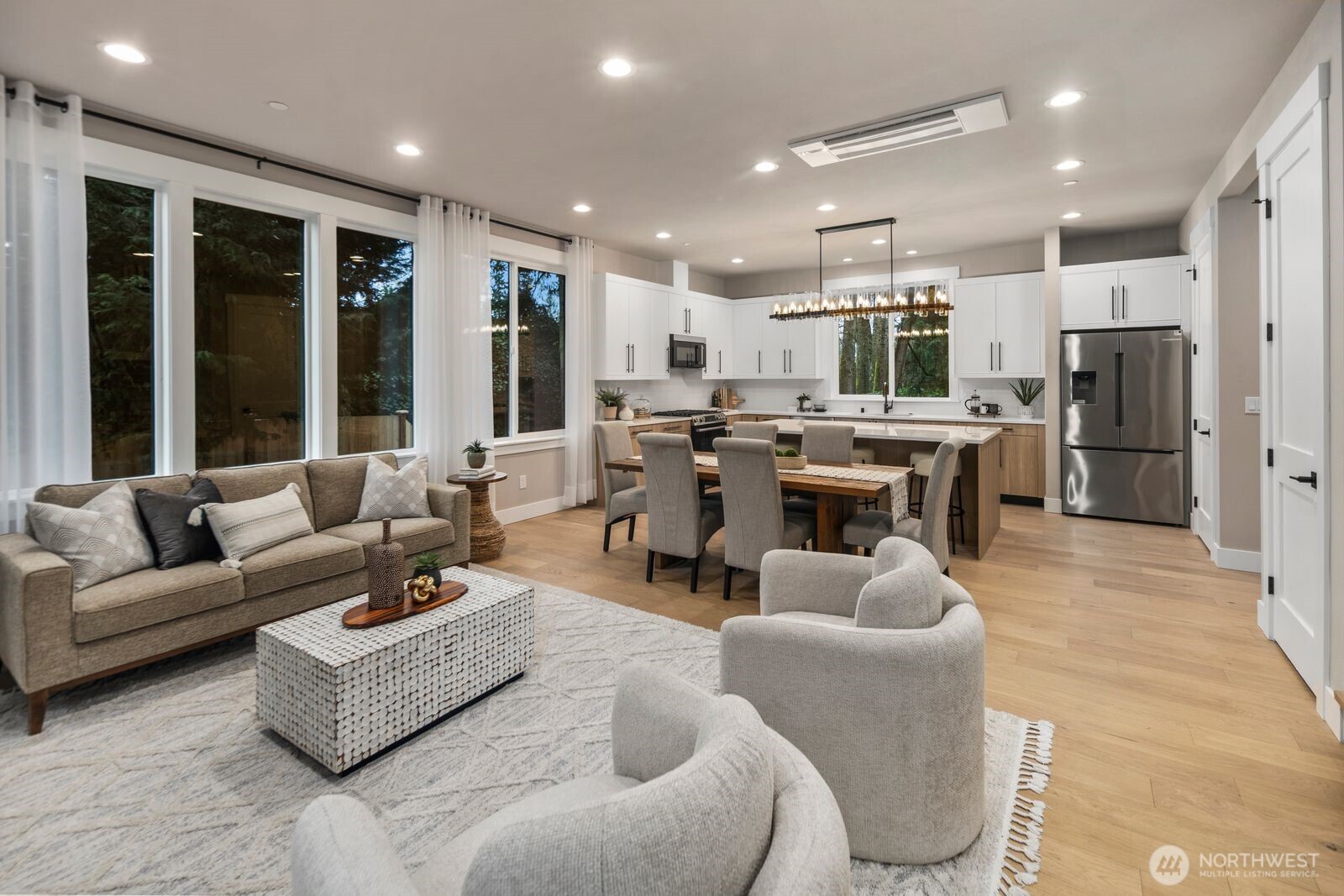 Expansive windows that bathe the interiors in abundant natural light.
