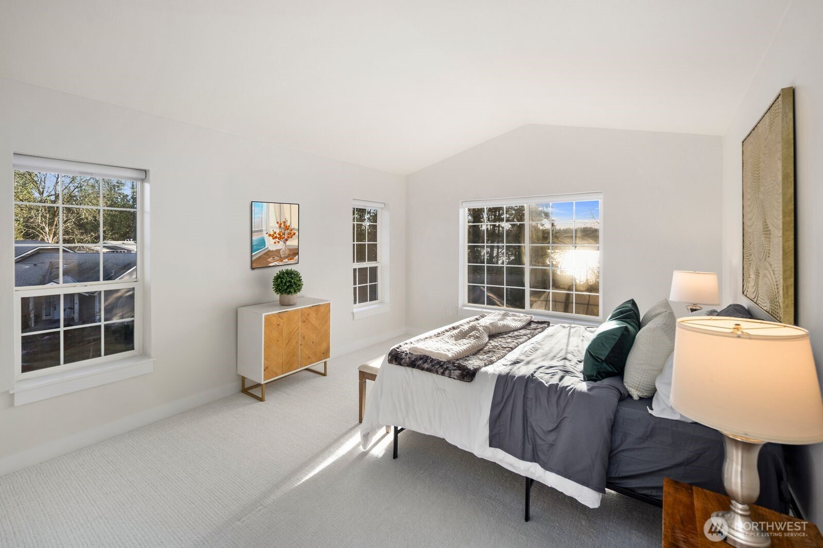 Spacious primary bedroom with Lake view