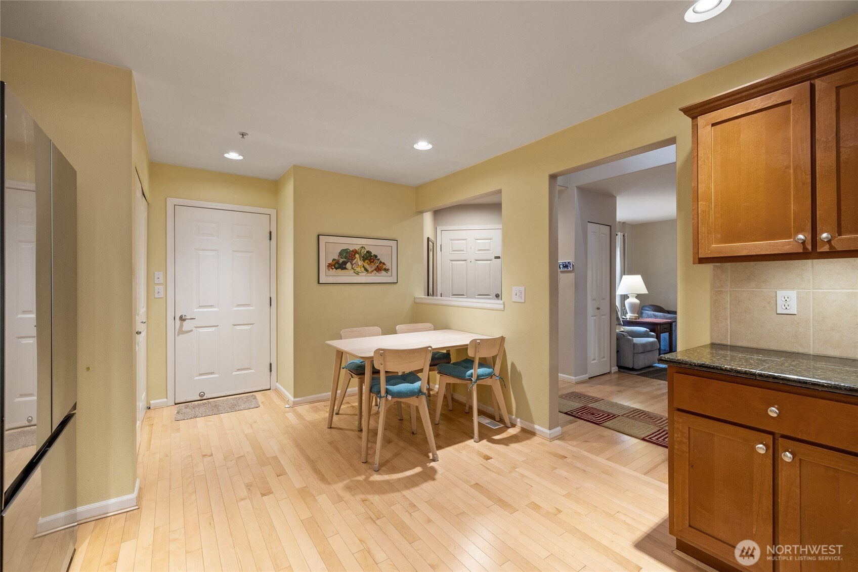 Kitchen is open to living room and dining room areas.