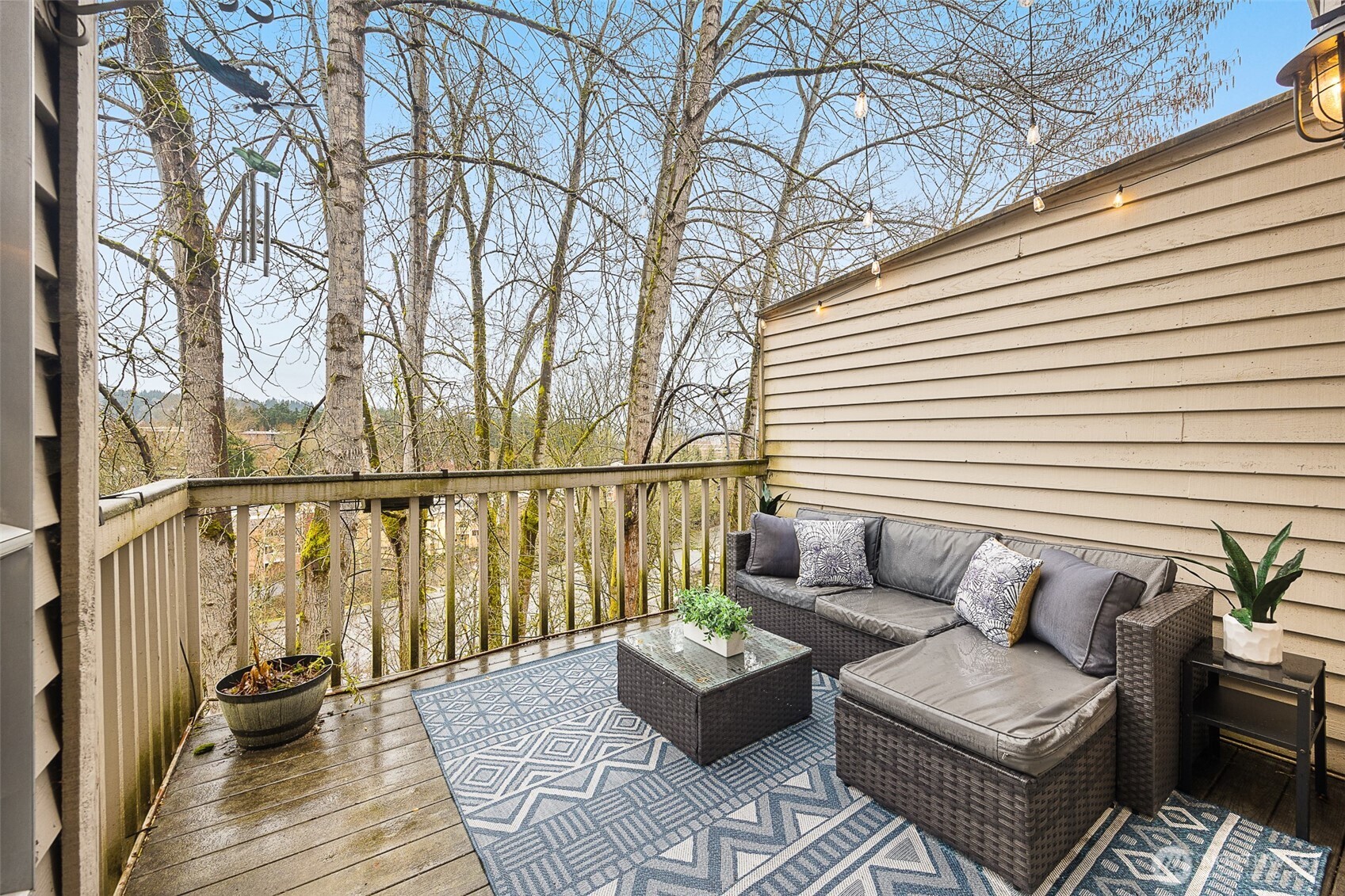 Balcony off the kitchen/living room is wonderful in the spring/summer with greenery surrounding it!
