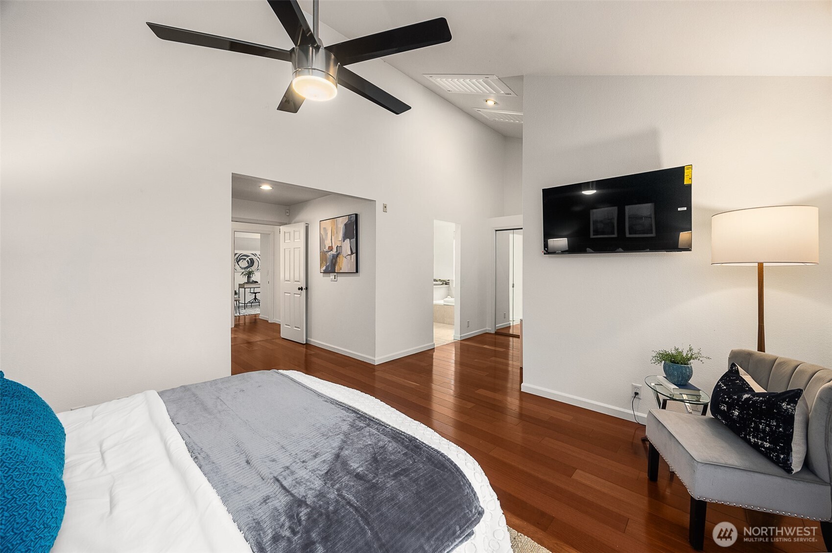 As an upgrade, this home has enclosed the lofted primary suite for privacy. The window wall was a thoughtful design to maximize natural light
