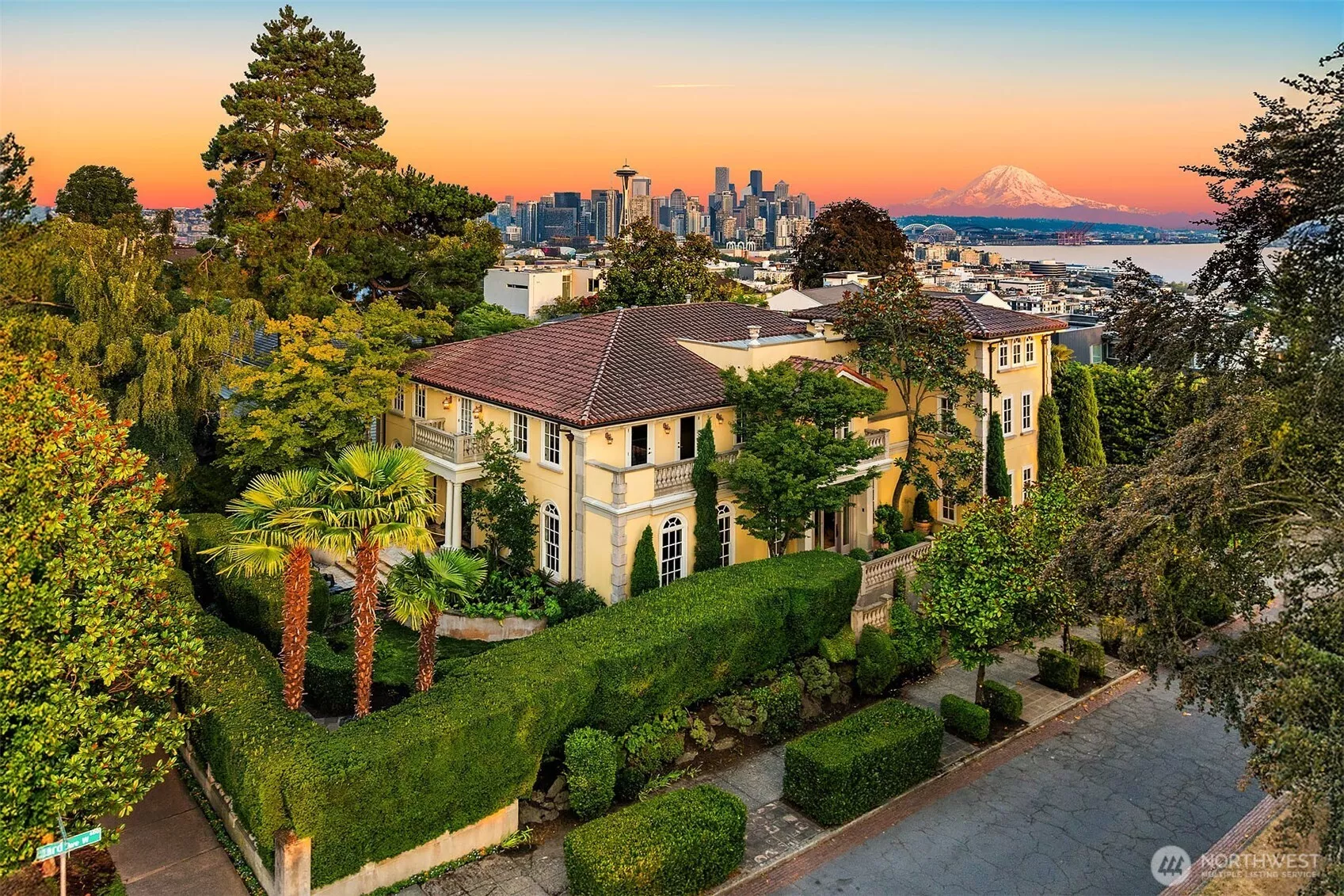 Welcome to 623 West Highland Drive, a rare offering with sweeping Sound to Space Needle views and a coveted corner lot setting on Queen Anne hill's favorite boulevard.
